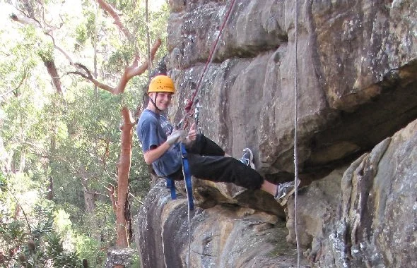 Abseil. Natural cliff face.