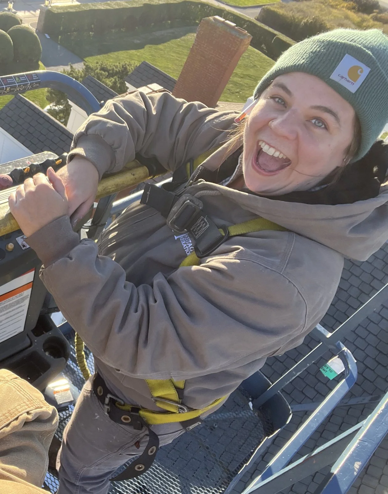 Kaitlyn, carpenter at Heritage Restoration, working on site
