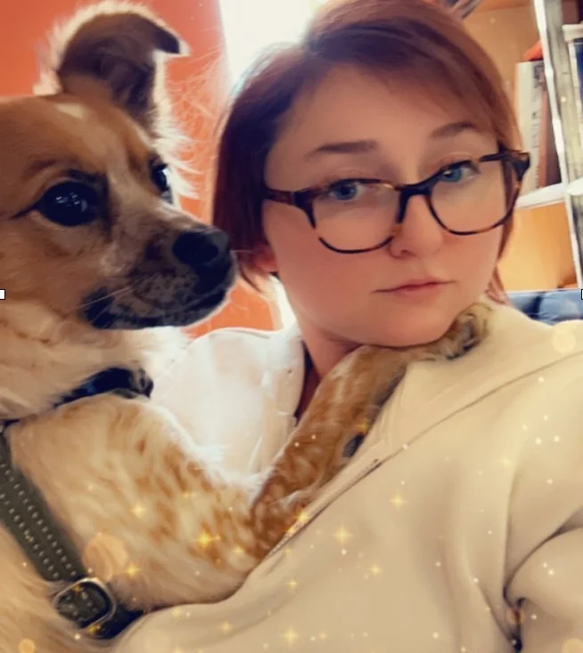 Jackie of Heritage Restoration with one of the office dogs