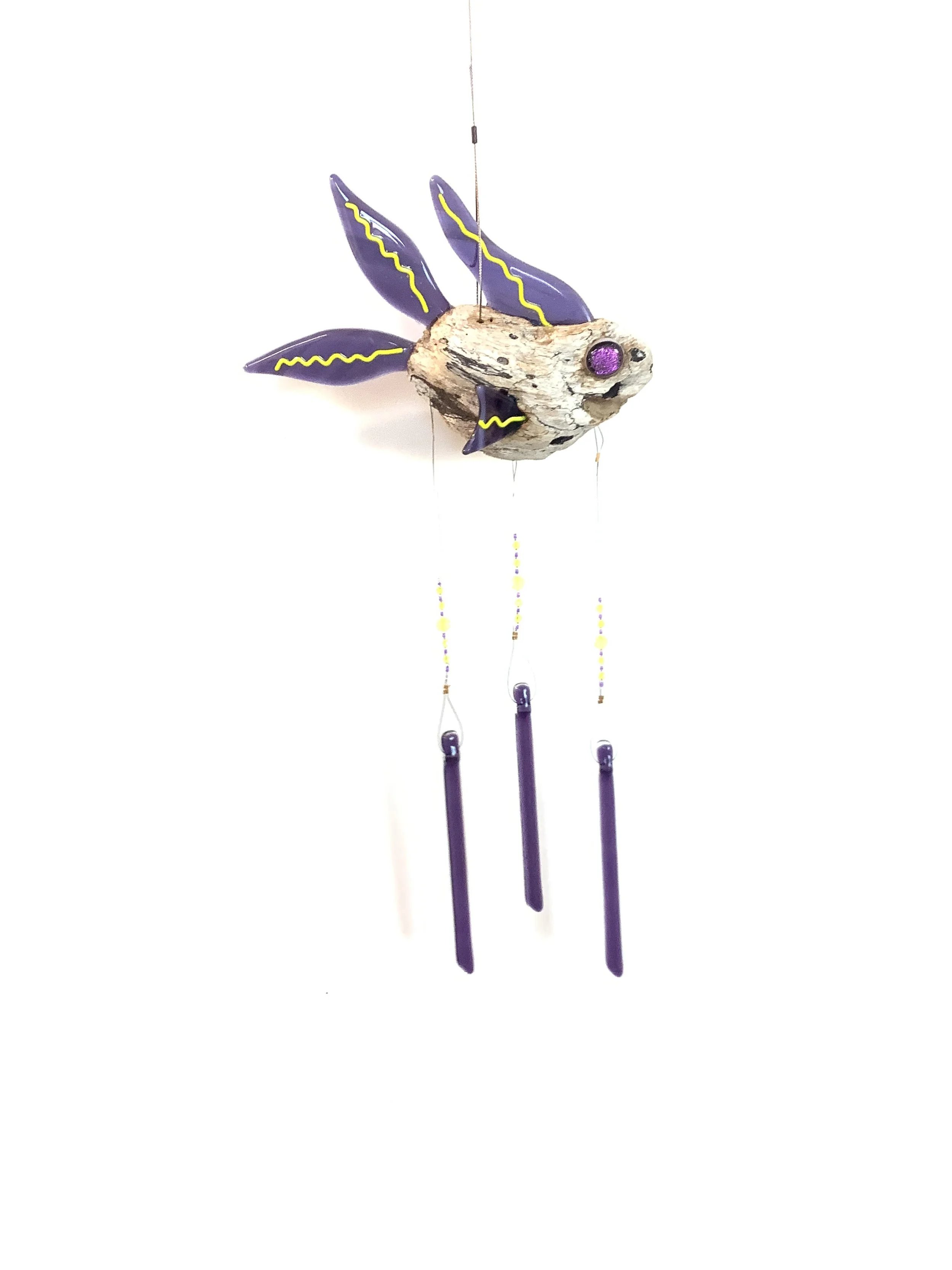 $80 "Sailor Swift" Purple fused glass driftwood fish chime with yellow squiggles and yellow and purple beads. Hangs 23"x7.5" from stainless wire with fused glass chimes. Contact to purchase.