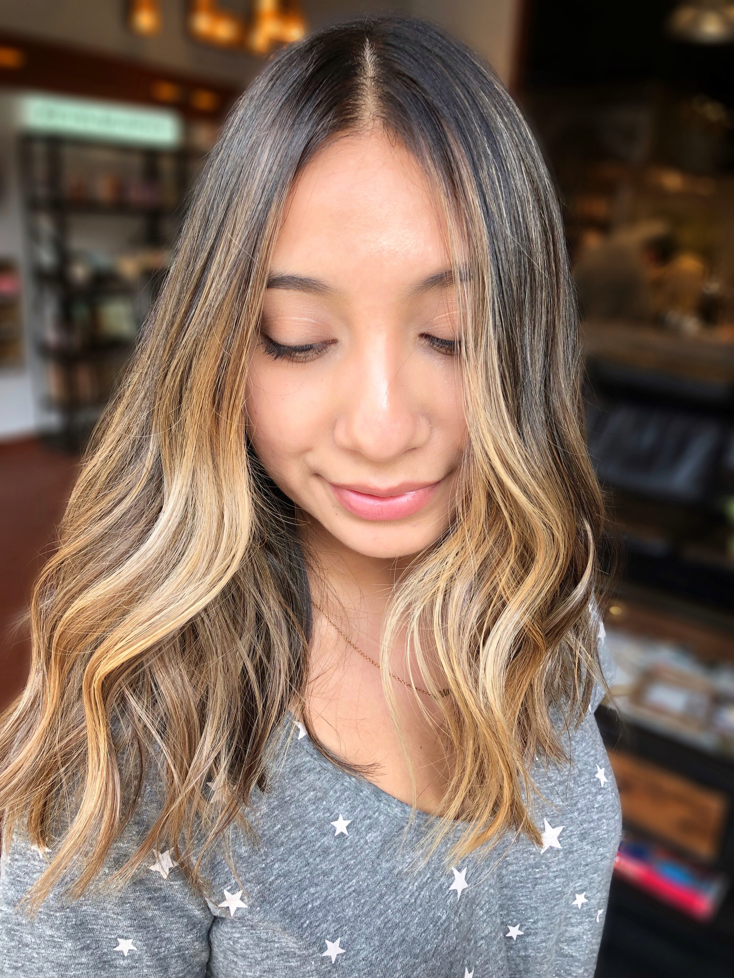Blonde balayage with a modern bob haircut by Geselle at The Co-Artist Studio in Capitola, California.