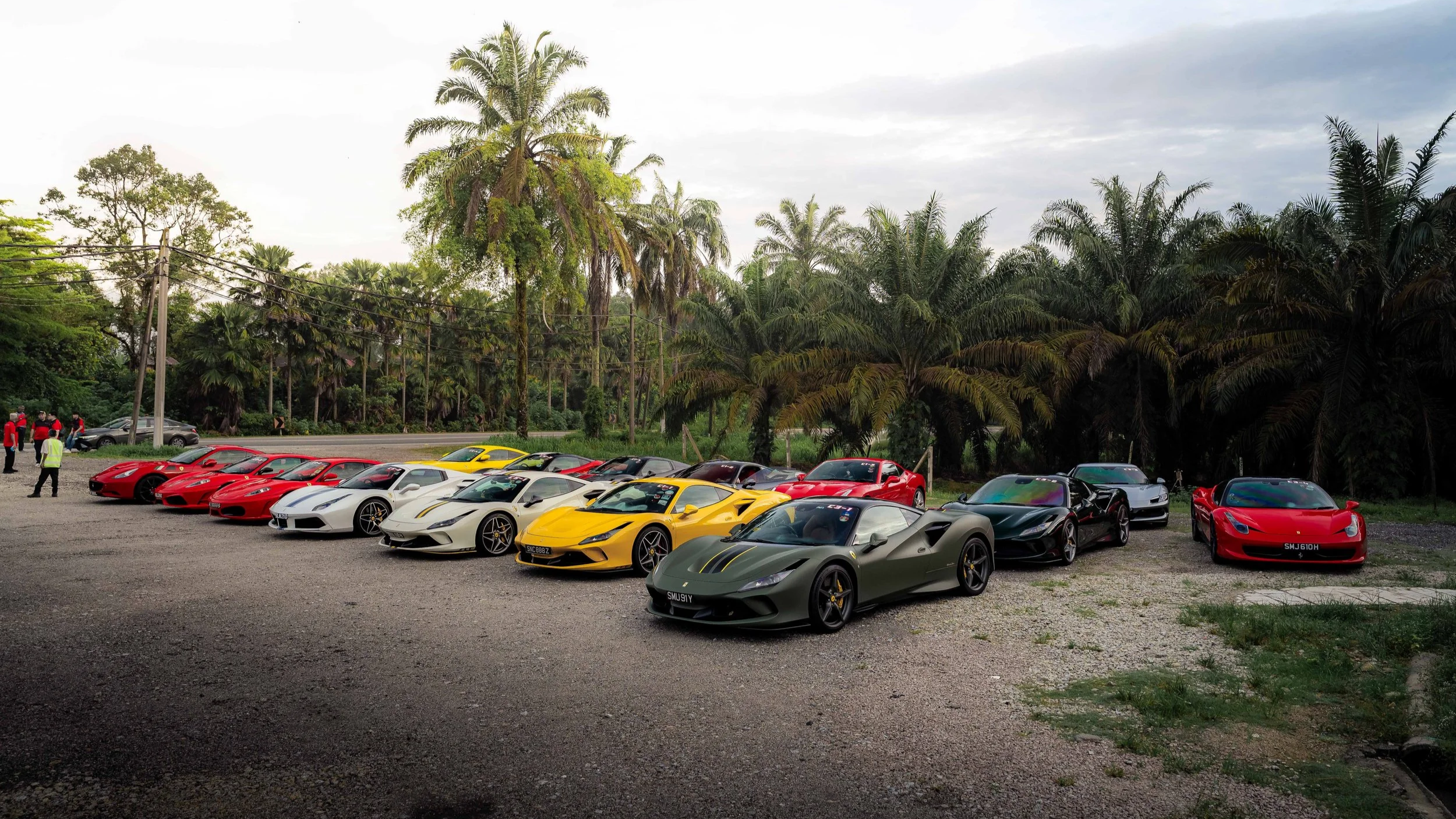 Automotive event photography by Han Yang Tay Photography, capturing Ferrari Owners Club Singapore cars during an overseas drive gathering.