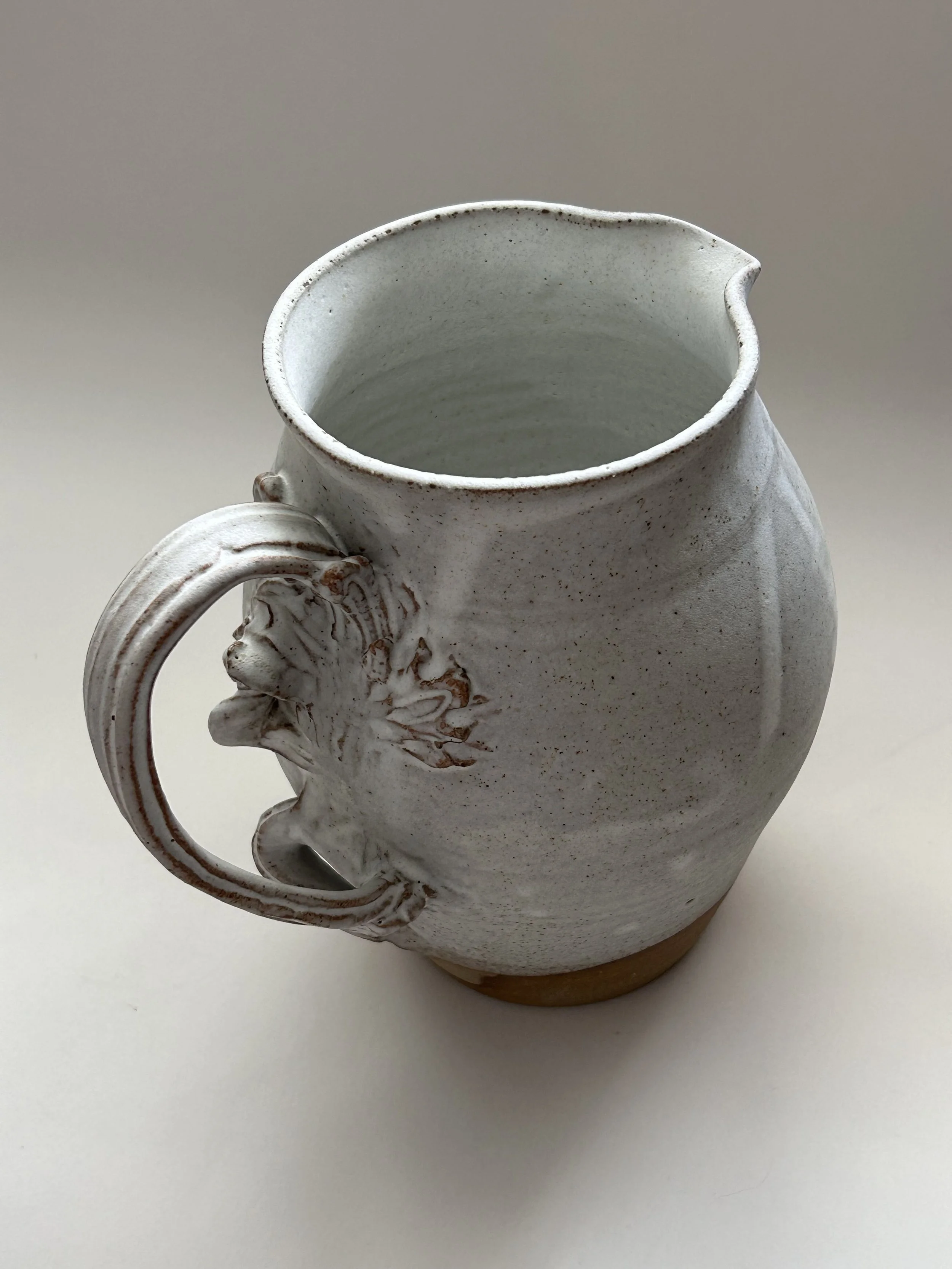 jug_with_ornate_swept_handle_4.jpg