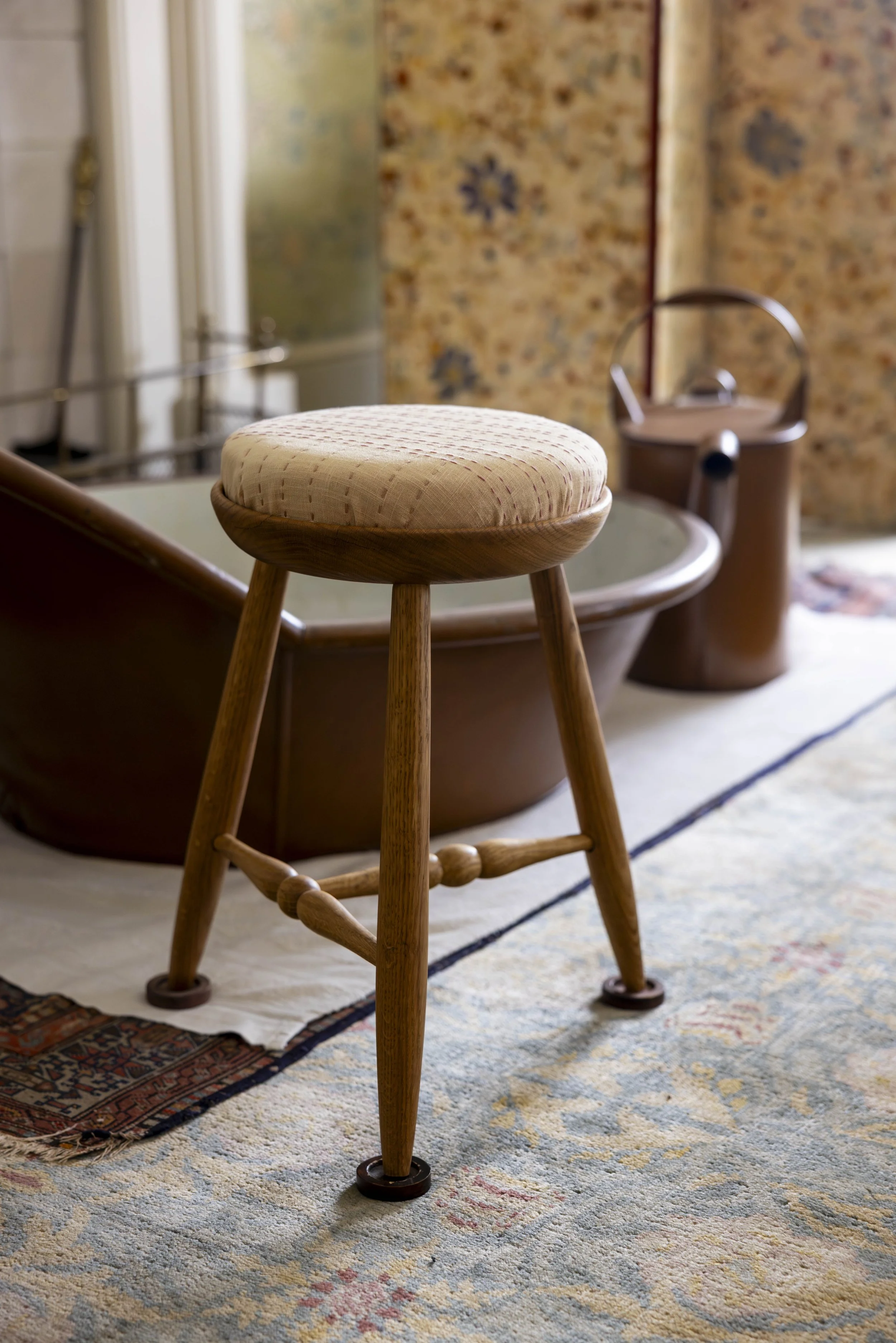 Wooden stool with a hand-stitched upholstered seat by Wendy March and Jubal Prevatte, displayed at Standen House as part of the Inspired by Standen exhibition.