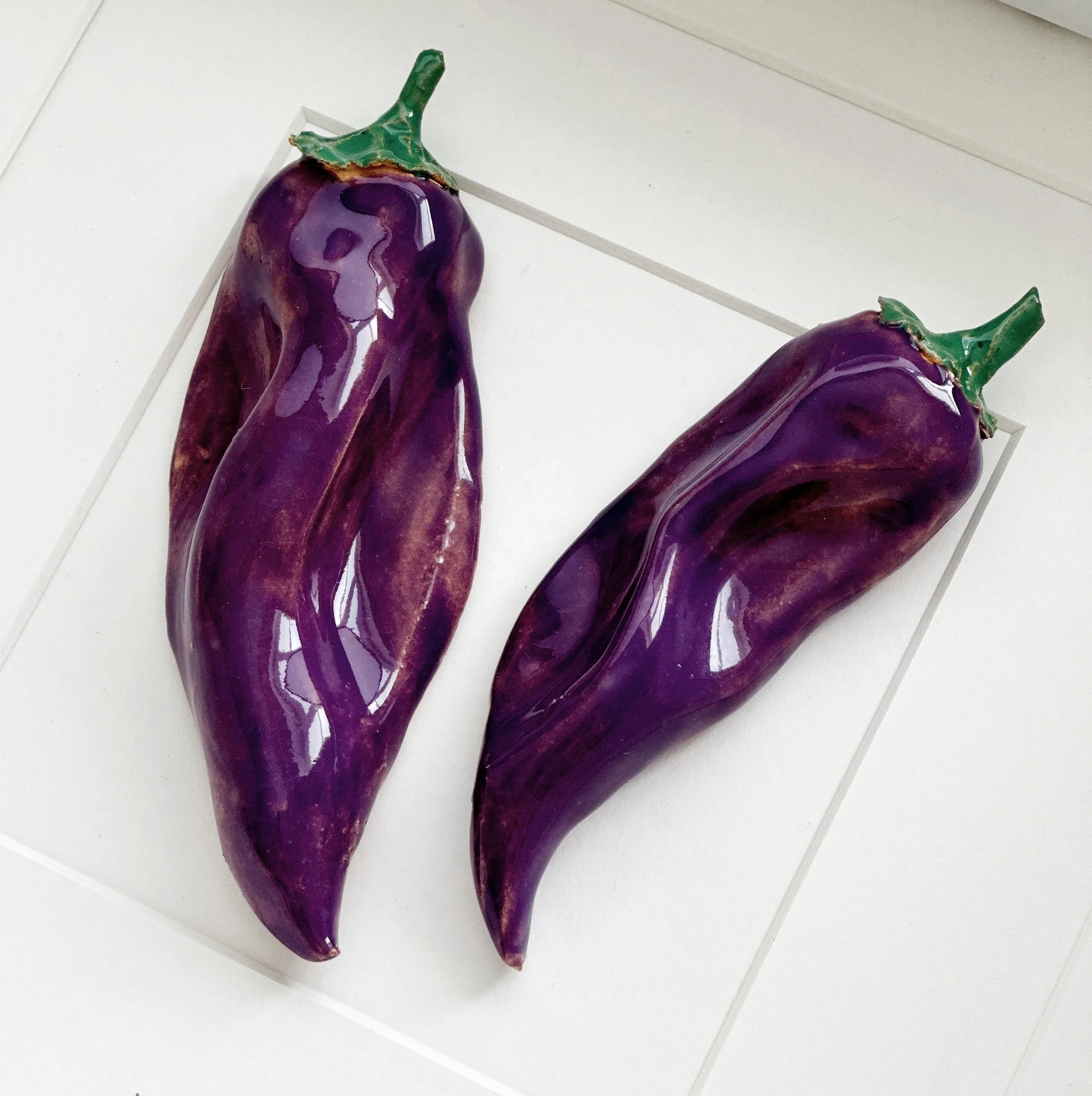 handmade ceramic kitchen wall art - purple peppers