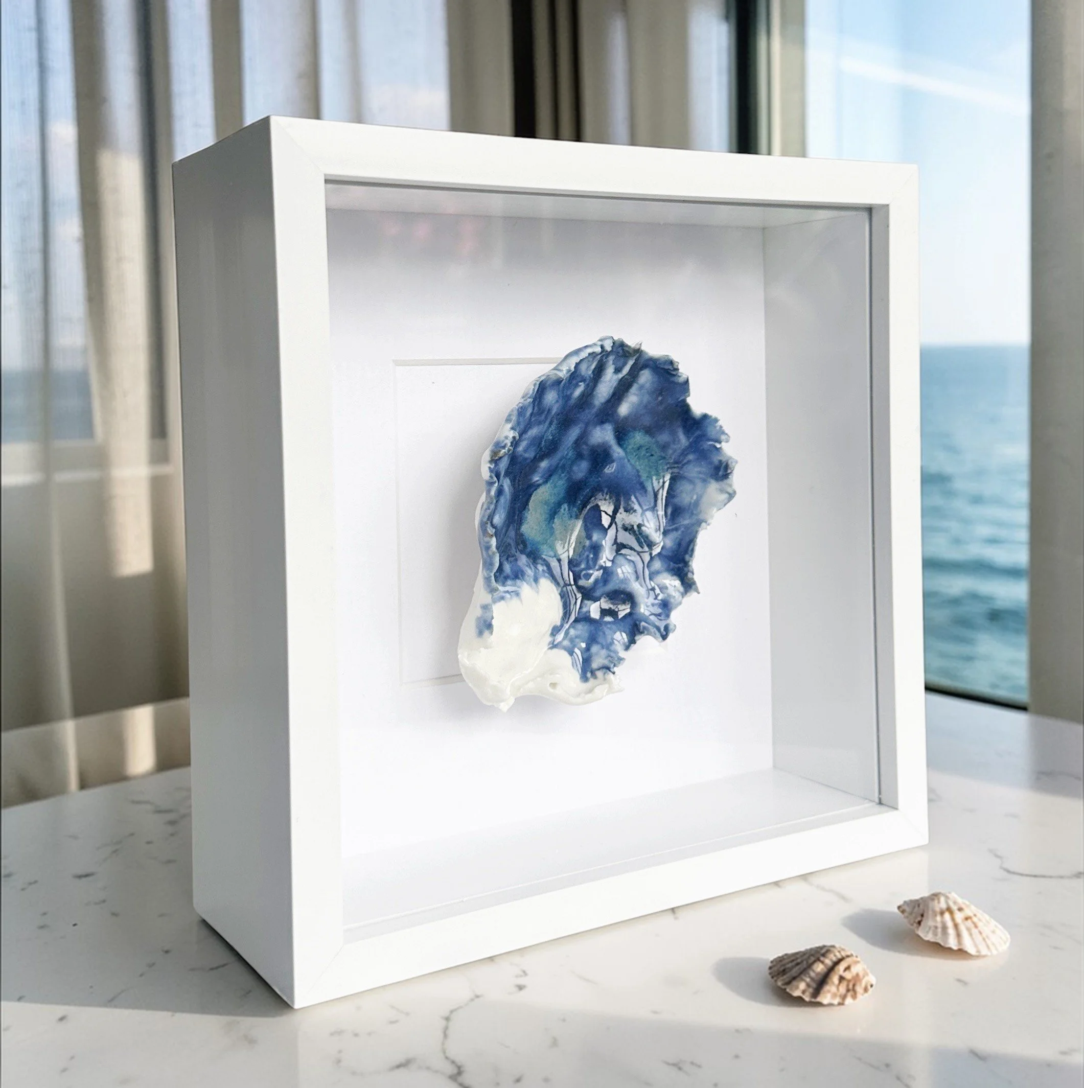 Coastal Wall Art of A Handcrafted Porcelain Glazed Shell: Still Waters
