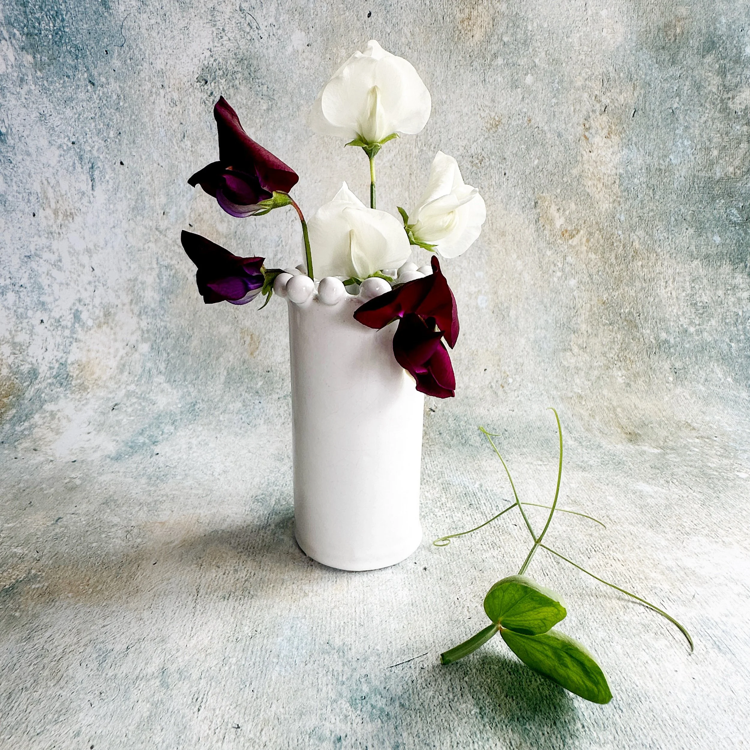 small single stem bud vases - simple posy - sweet peas