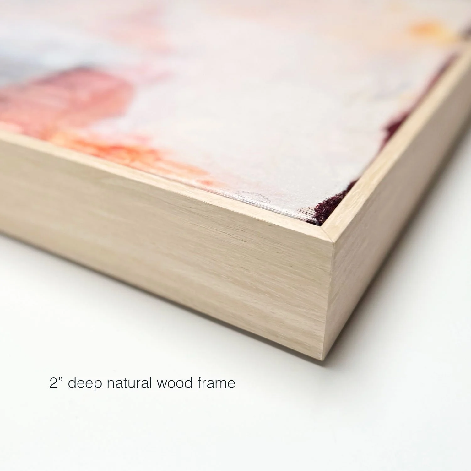 Closeup shot of natural wood frame option for canvas art prints by Seattle artist, Laurie Baars.