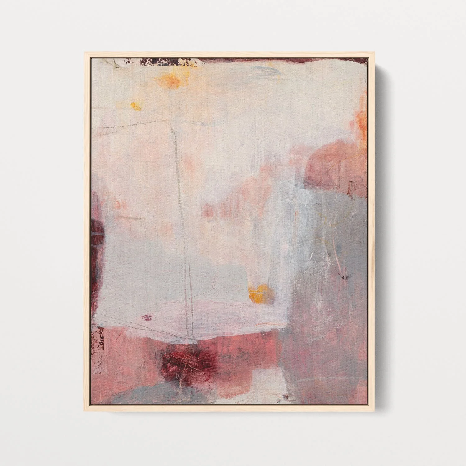 Abstract art print by Laurie Baars in shades of pink, yellow, and gray, shown in a maple float frame.