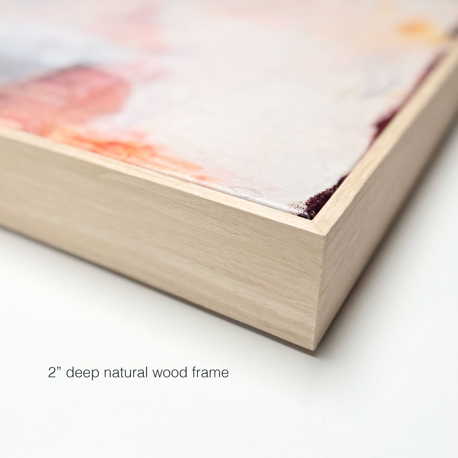 Closeup shot of natural wood frame option for canvas art prints by Seattle artist, Laurie Baars.