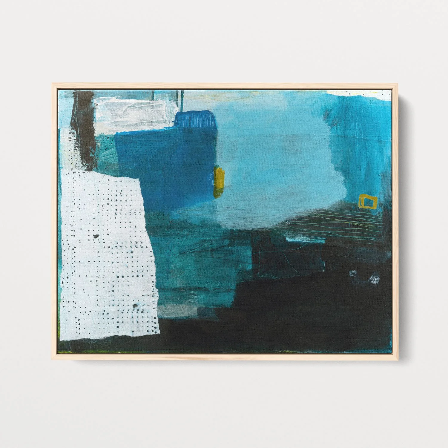 Abstract art print by Laurie Baars in shades of blue, shown in a natural wood float frame.