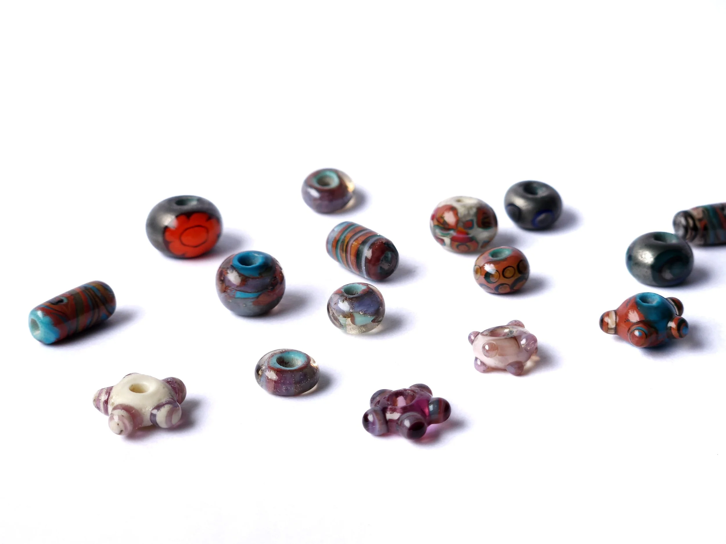 Selection of glass lampworked beads. 