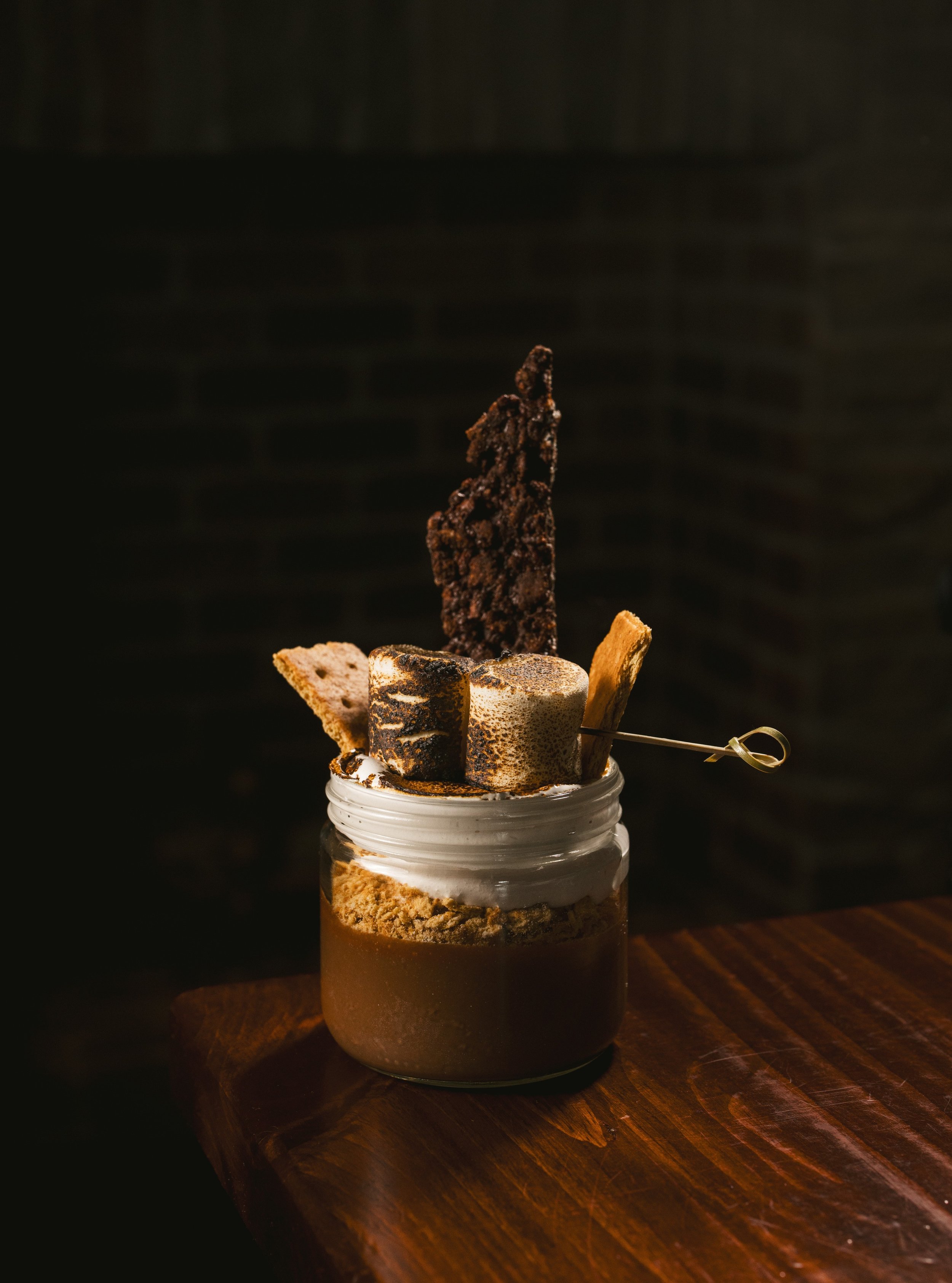 A campfire classic, but make it Parkside. 

Layers of rich chocolate pot de cr&egrave;me, toasted marshmallow, graham cracker crumble and chocolate rice crispy bark &mdash; because some cravings deserve to be taken seriously.

S&rsquo;mores in a Jar.