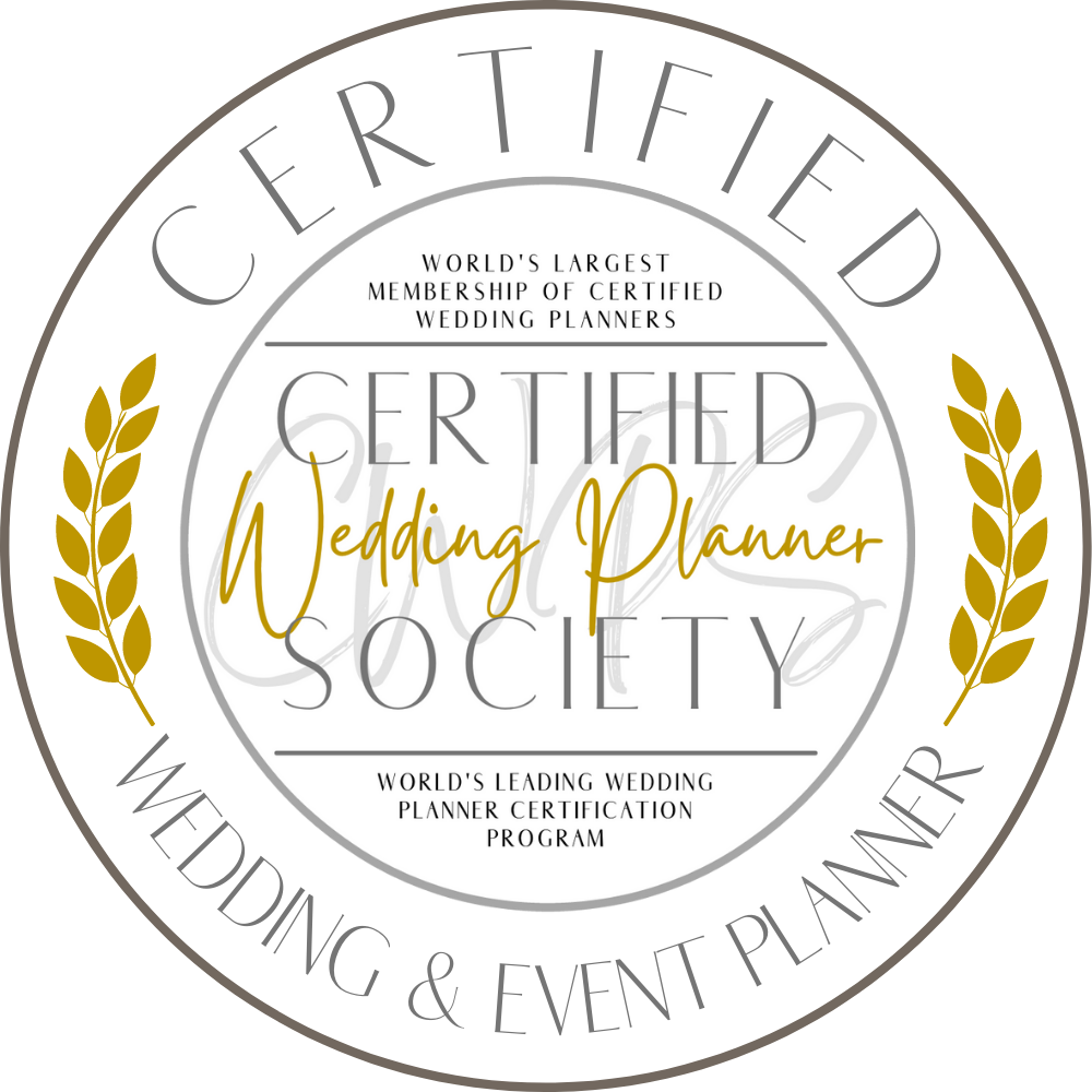 A circular badge with text indicating certification from the Wedding Planner Society, highlighting that it is the world's largest organization of certified wedding planners and the leading wedding planner certification program. The badge features a white background with gray and gold accents, including gold laurel branches on each side.