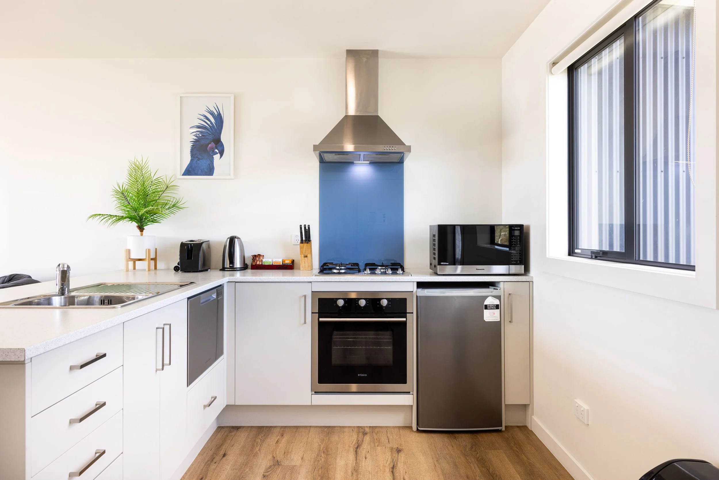 Modern kitchen interior with clean lines and natural light.jpg