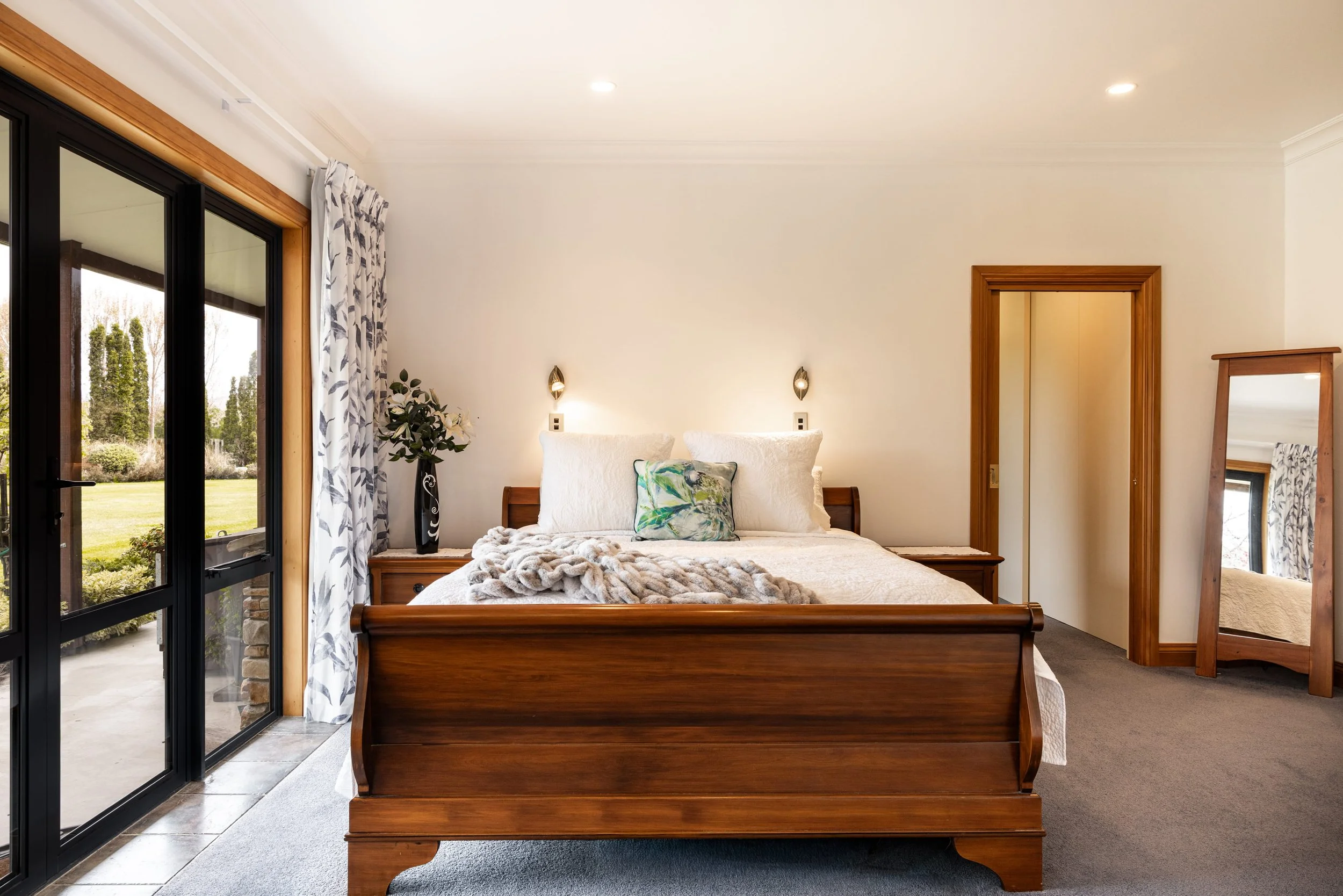 Bright bedroom interior with natural light and clean styling.jpg