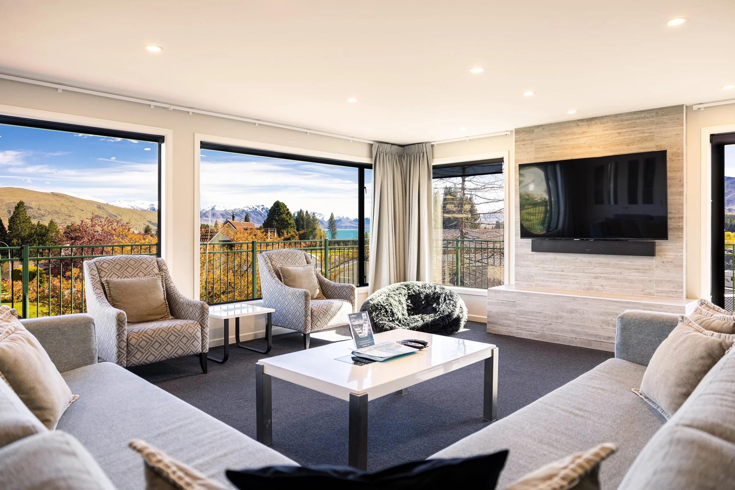 Spacious living area with seating arranged for comfort.jpg