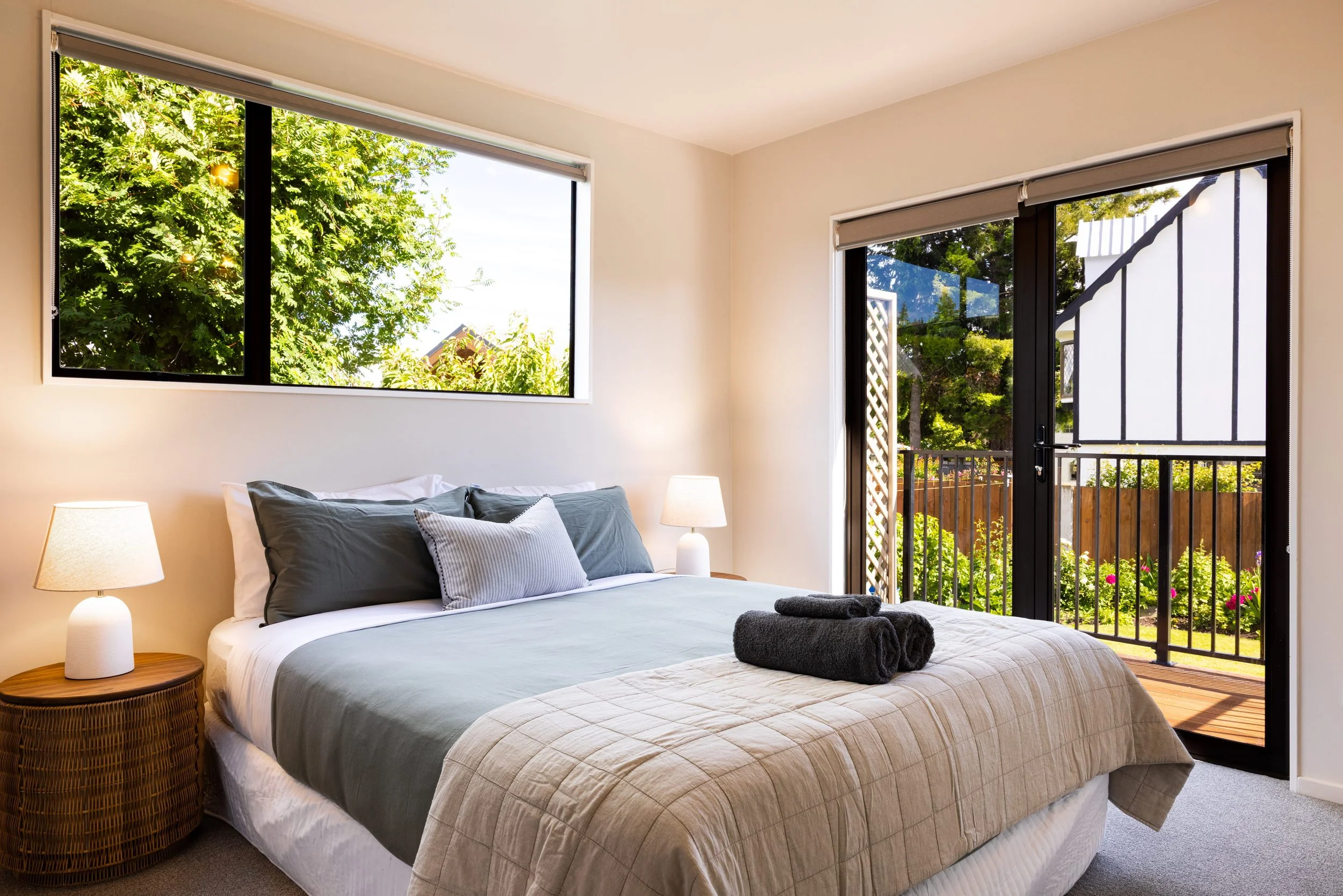 Modern bedroom showcasing neutral tones and simple décor.jpg