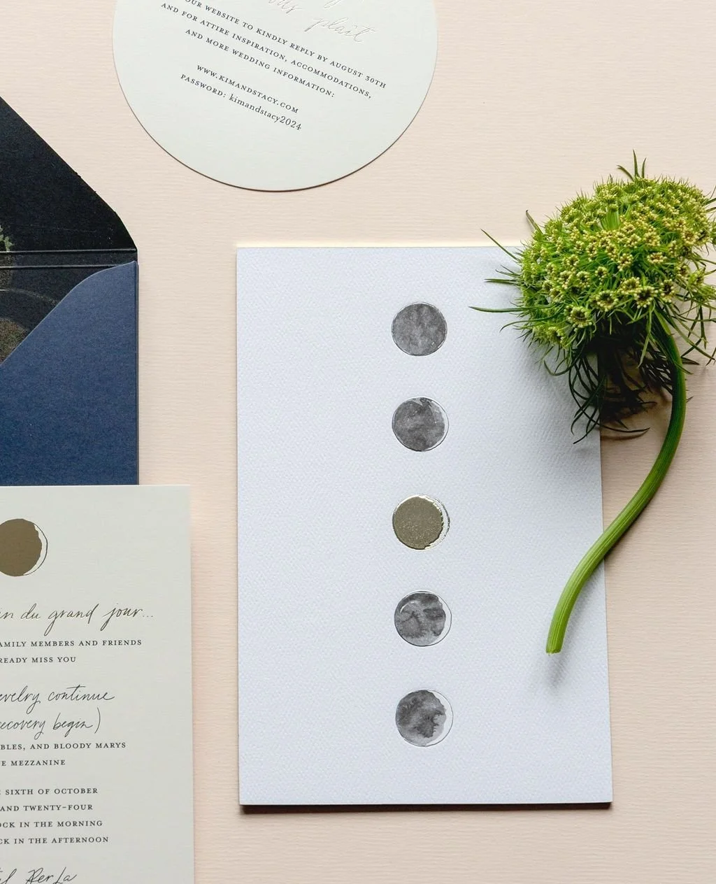 This moon art piece was the back of the wedding invitation card. It was on a watercolor paper and the other side contained an engraved invitation card on smooth paper. The wedding night moon is in the center, embossed (raised) and in champagne gold f