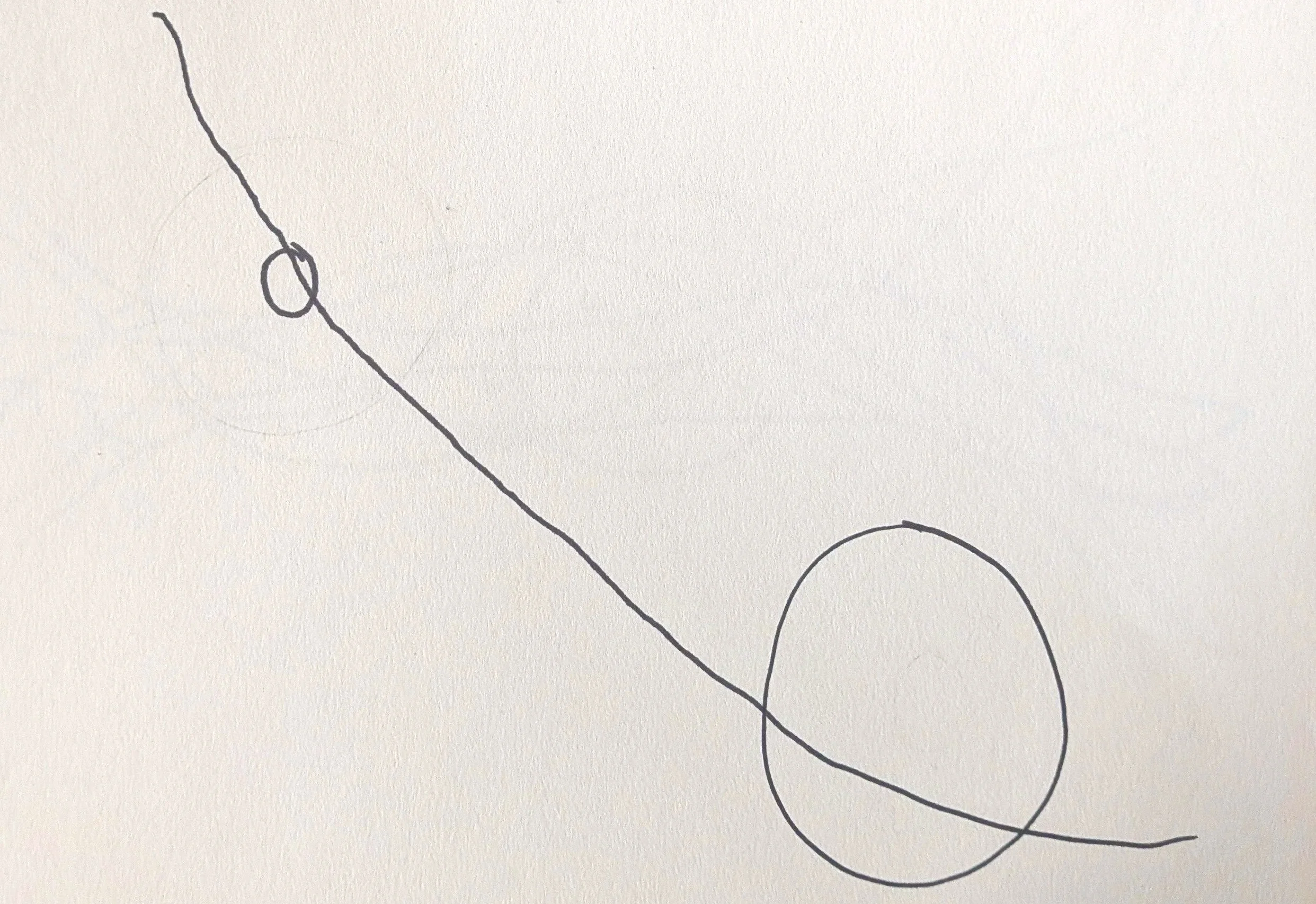 Beginning stage of Kate Jackson's neurographic drawing process with circles and ink lines on paper.