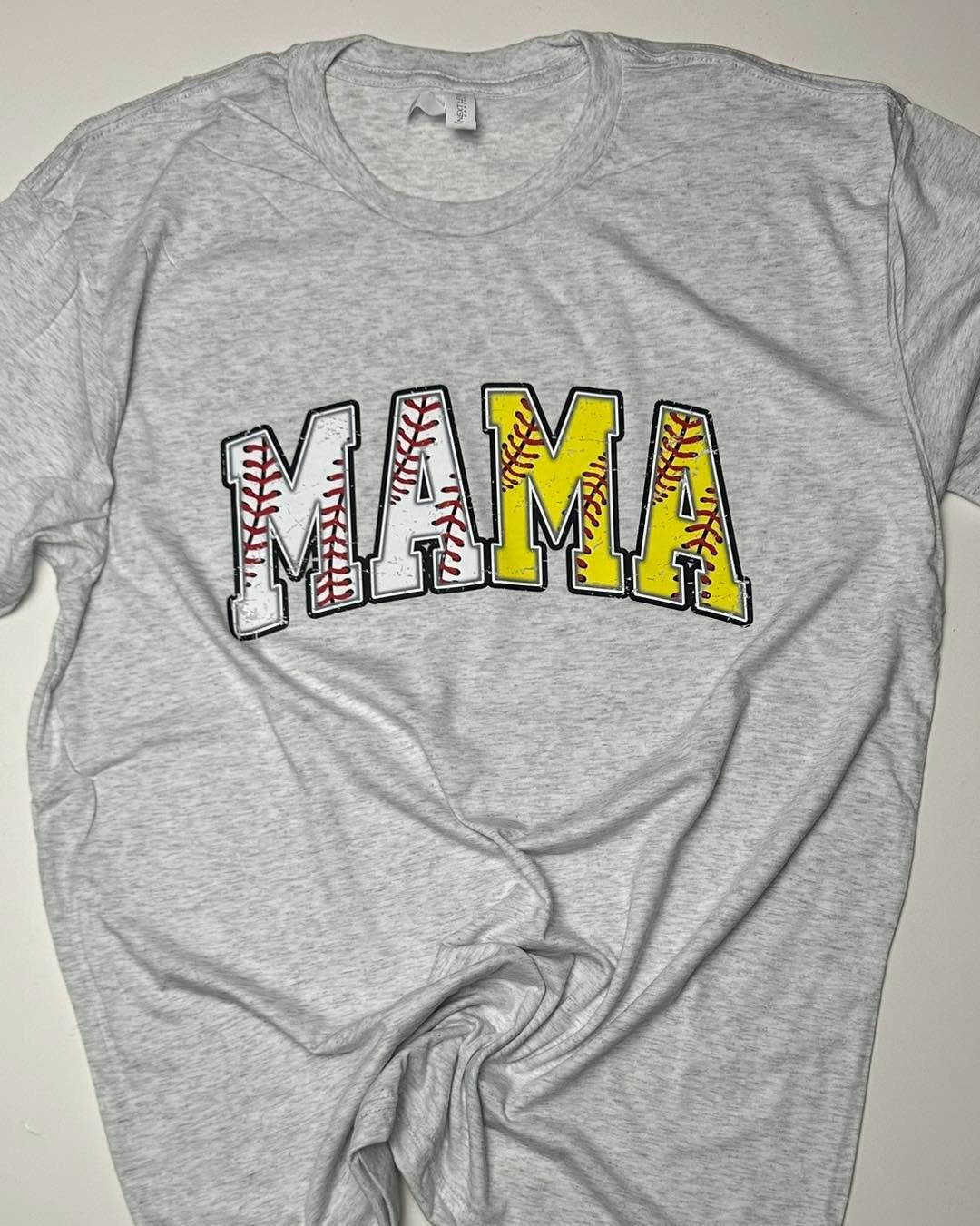 ⚾️ Calling all Baseball/Softball Mamas! 🥎
Show your pride with this NEW design! Perfect blend of comfort and style in a soft heather gray. Those stitches say it all 🎯
✨ Features:
• Soft, comfy cotton blend
• Baseball/softball stitch des