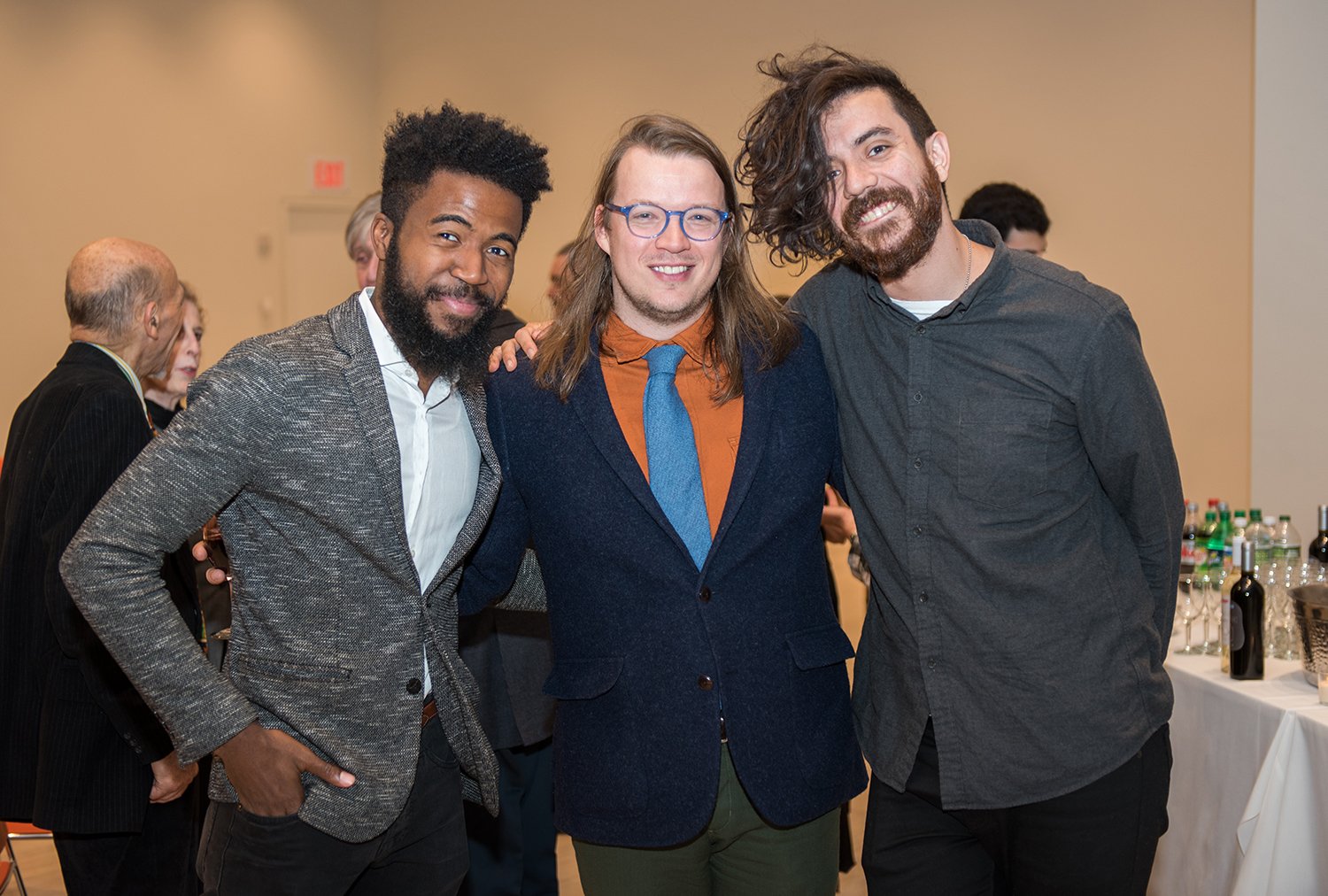  Poets Josh Bennett (left), alumnus Justin Boening '11 (middle), and Kaveh Akbar (right) © Joel Jares 