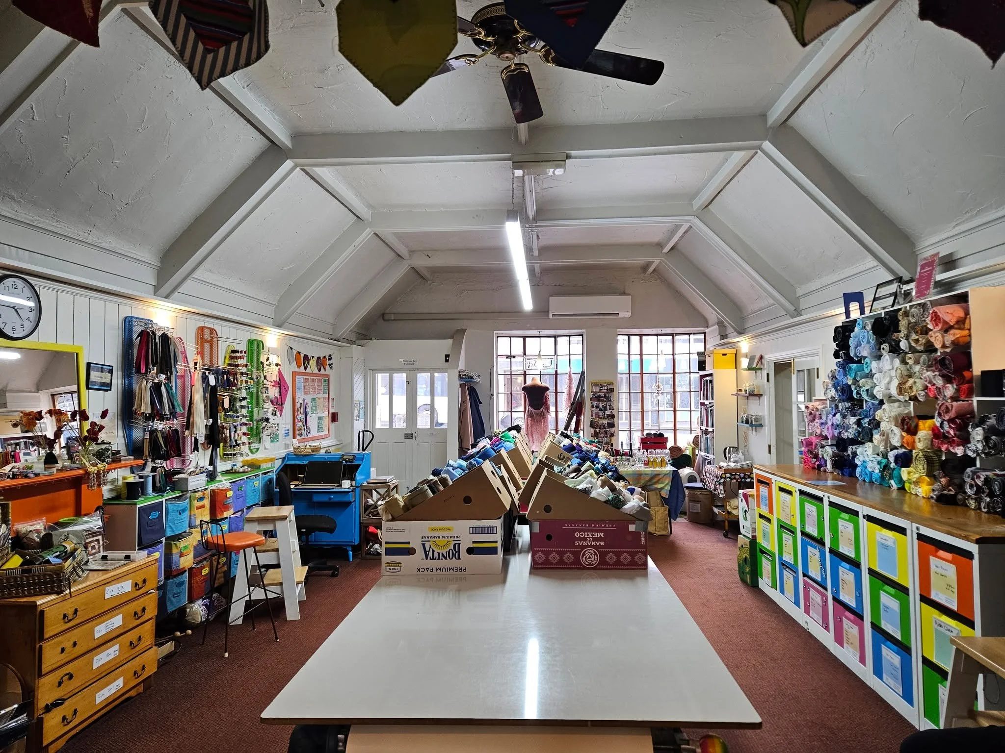 Did you know that our studio has two big cutting tables, six modern sewing machines, 3 overlockers, 2 ironing stations and a whole supply of useful sewing equipment including sharp shears, tailors chalk, quilting boards, and more? Not to mention the 