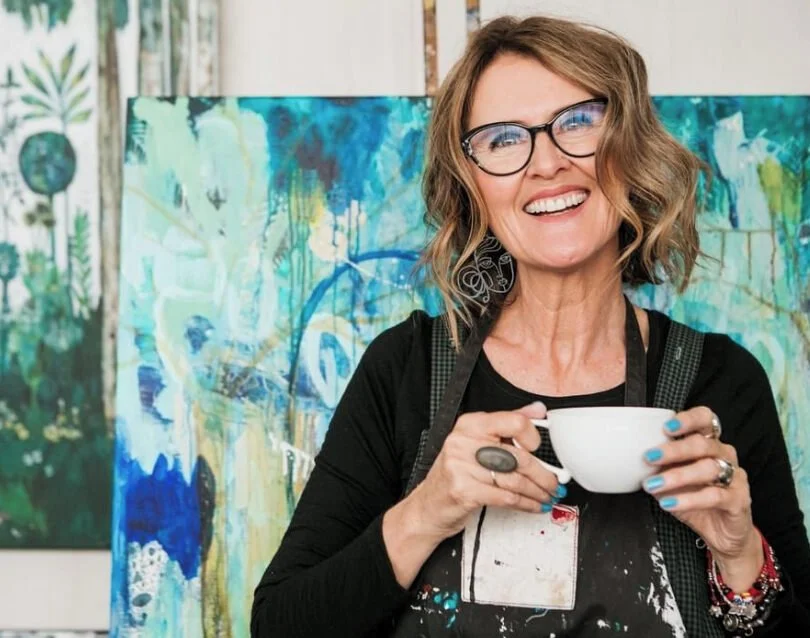 Sunshine Coast artist Denise Daffara creates richly layered paintings filled with colour, symbolism, and a strong sense of personal narrative. Her work brings together still life, botanical forms, interiors, and the feminine presence, arranged in tho