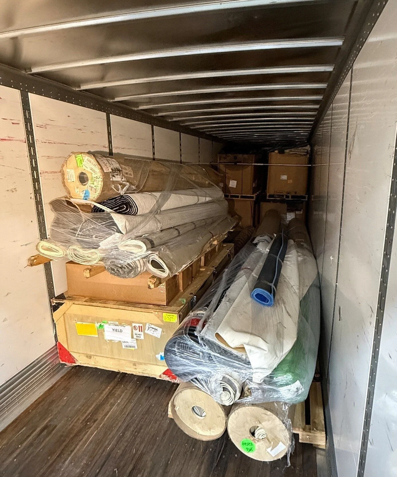 Genesis Exhibits loaded trucks with Brumark recycling