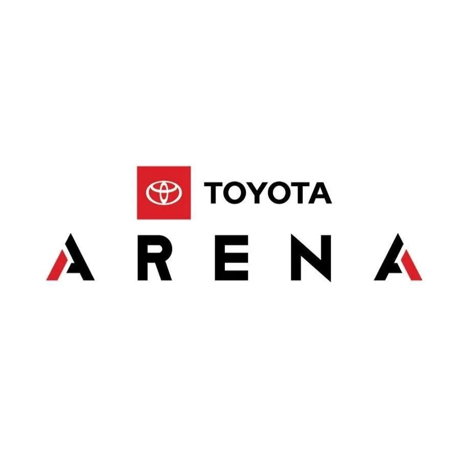 Toyota Arena logo with the Toyota emblem, name, and stylized text spelling ARENA, accented with red and black colors.
