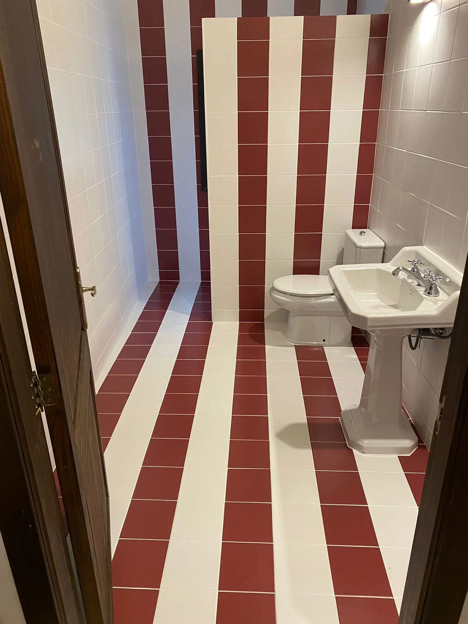 Complete bathroom renovation, including installation of a walk-in shower.