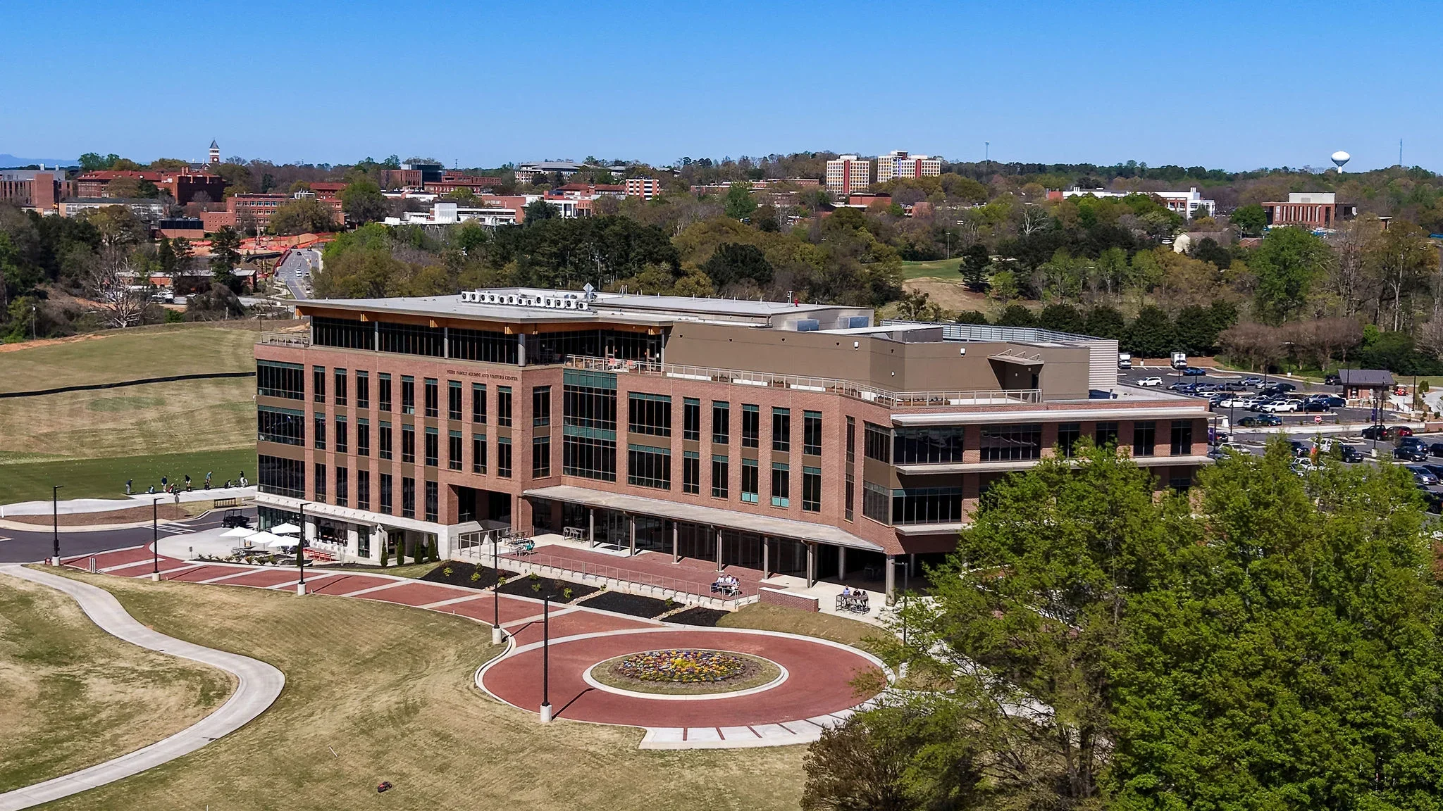 Aerial view of Clemson University’s Nieri Family Alumni and Visitors Center showing the completed terrace expansion and surrounding campus.