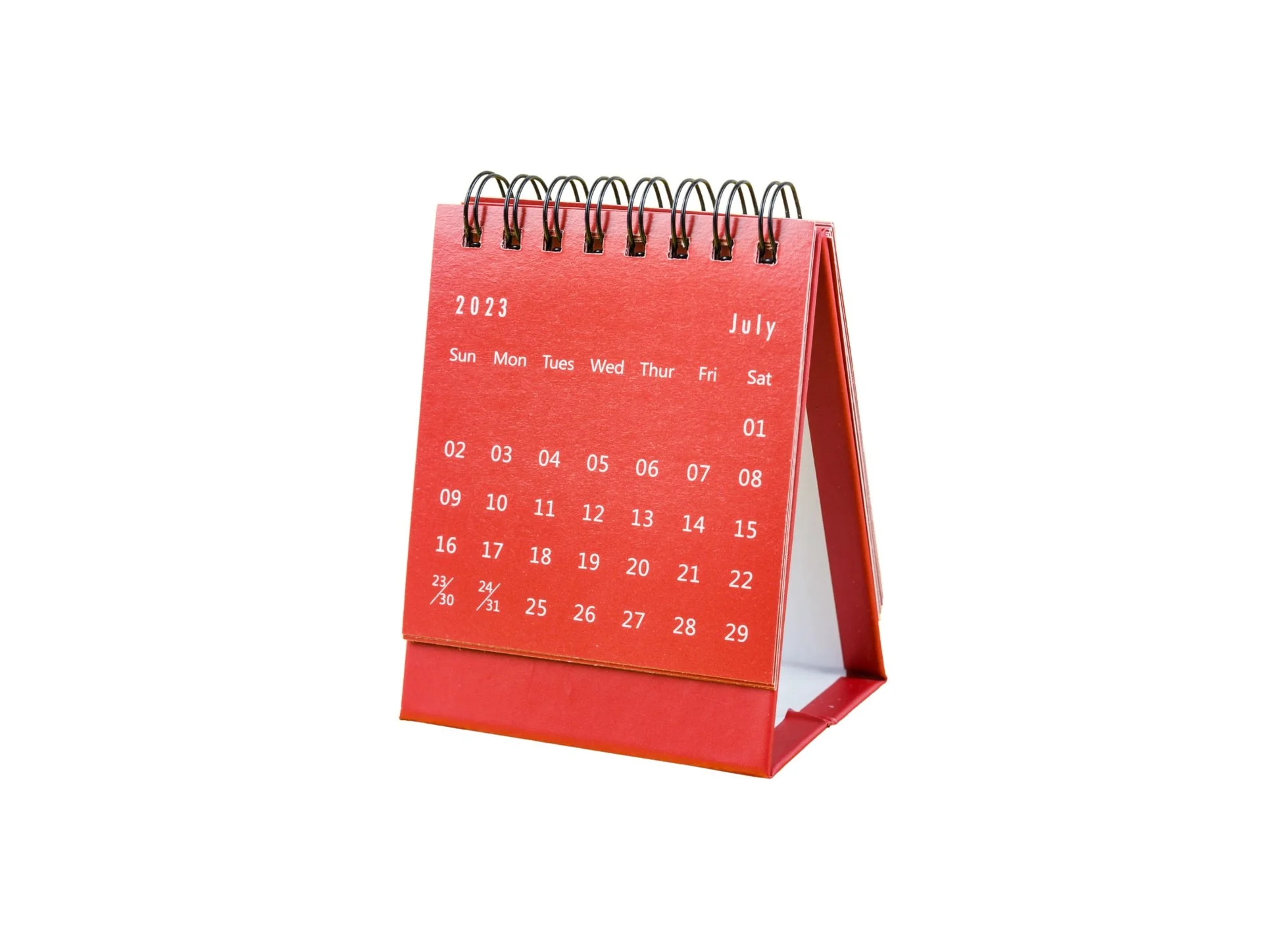 Red desk calendar displaying July 2023, with dates arranged in a grid format and months labeled in white text.