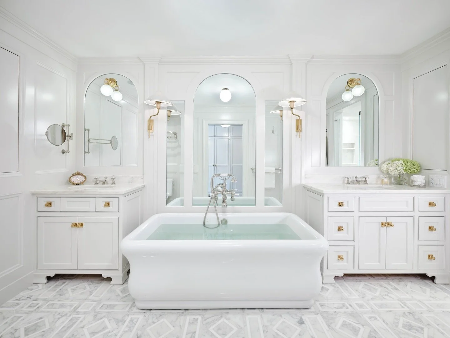 📝 #DesignDiaries: For clients who love a good soak, the bathtub had to take center stage &mdash; and what a centerpiece it is! We set this sculptural tub as the room&rsquo;s focal point, echoing its curves in mirrors that nod to the geometry of Roma