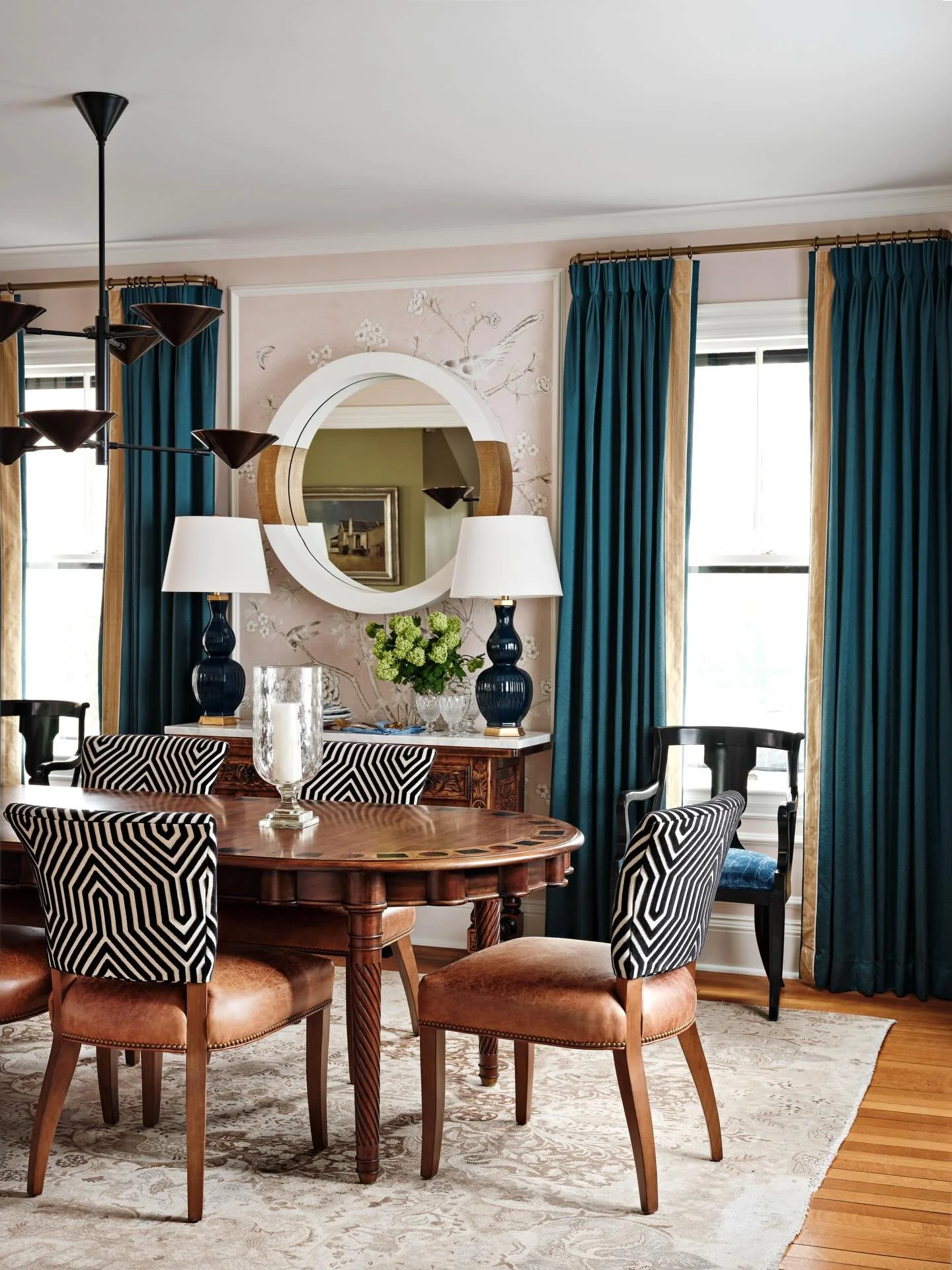 Steeped in history, yet designed with a modern edge. This dining room breathes new life into this historic home by blending statement-making patterns with sumptuous textures.

Interior design: @robingannoninteriors
Builder: @highline_constructionllc
