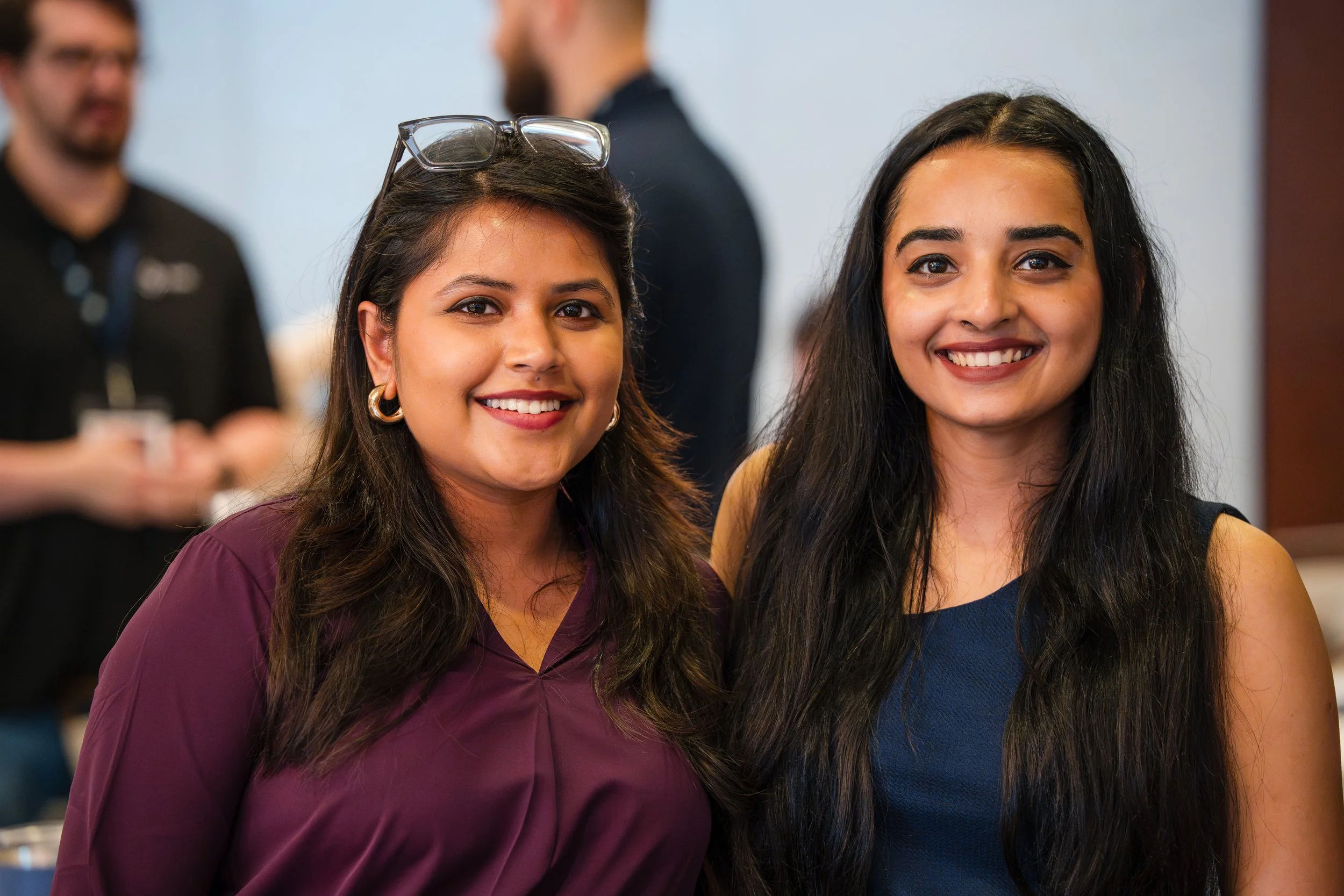 Conference attendee smiling during seminar session