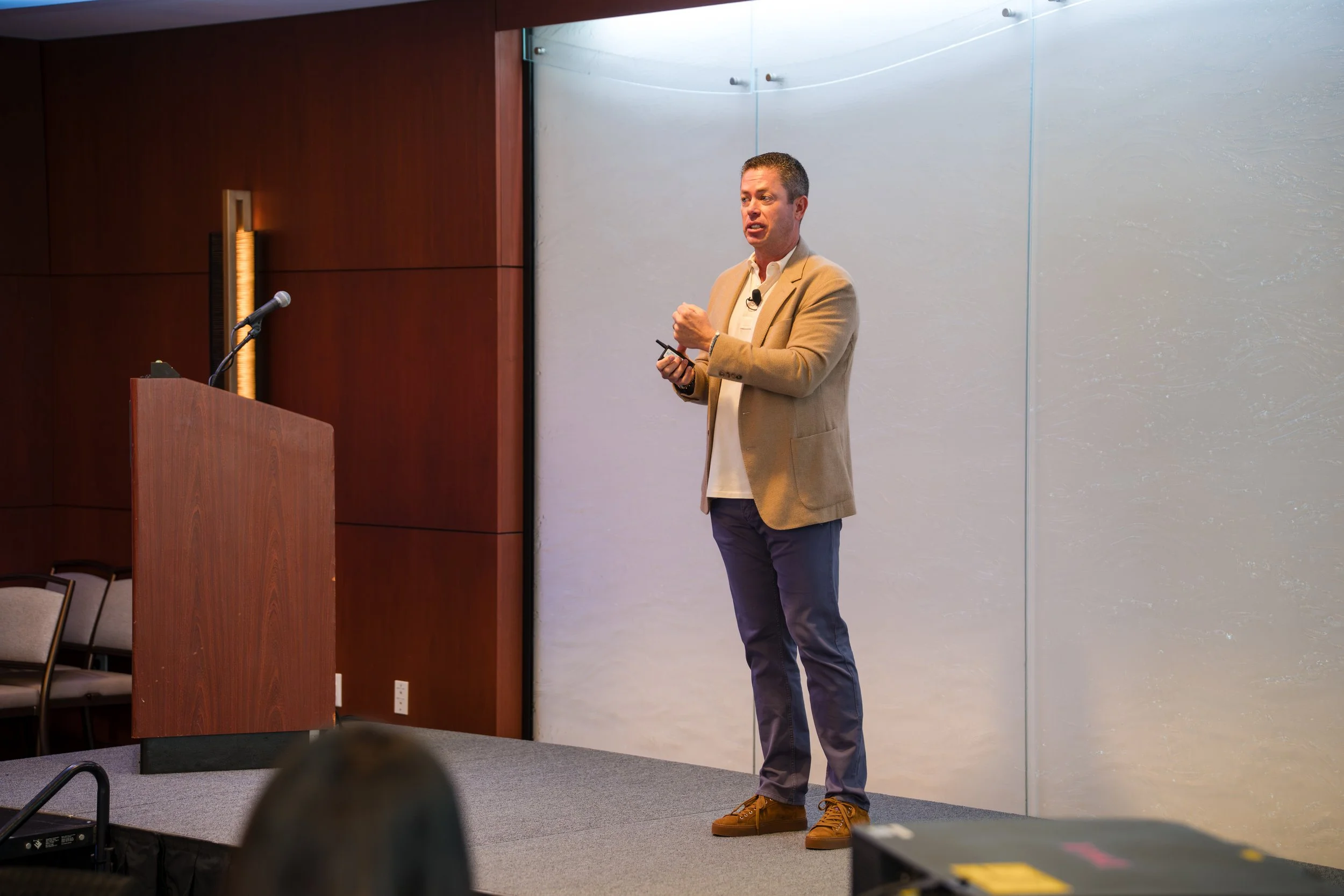 Conference speaker presenting during seminar