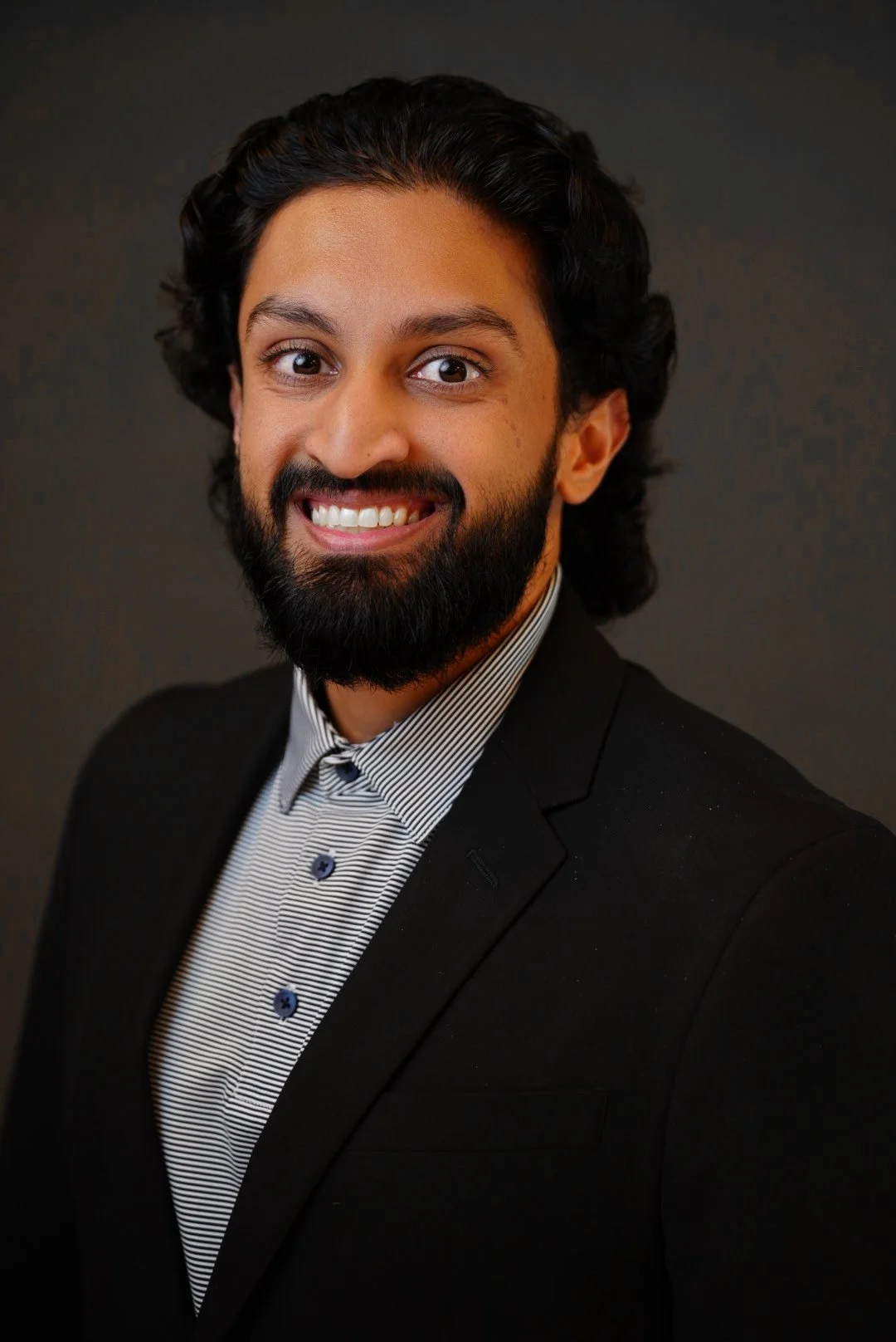 Corporate headshot of business executive