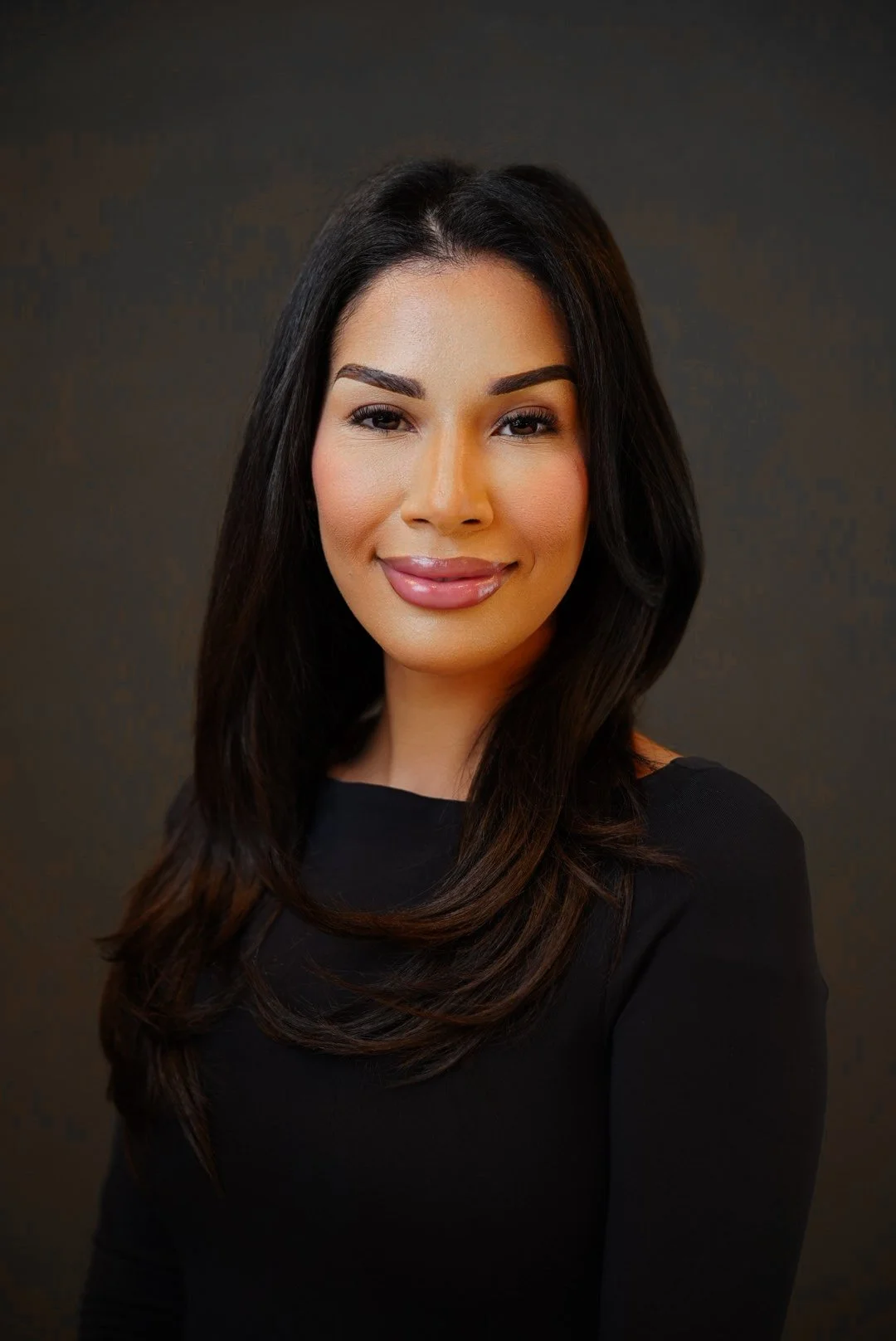 Corporate headshot of business executive