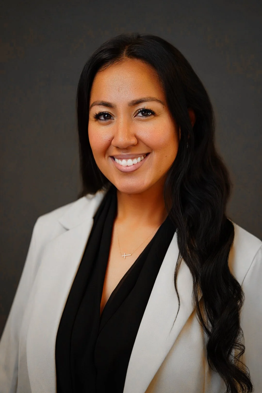 Professional corporate headshot of business executive