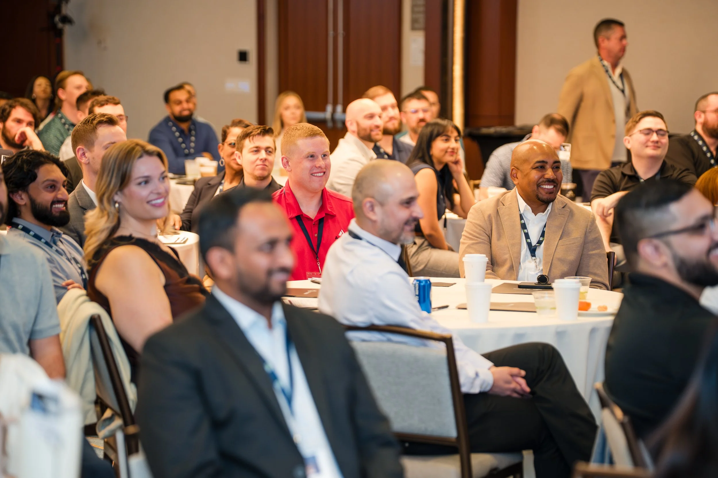 Corporate conference audience seated during seminar session