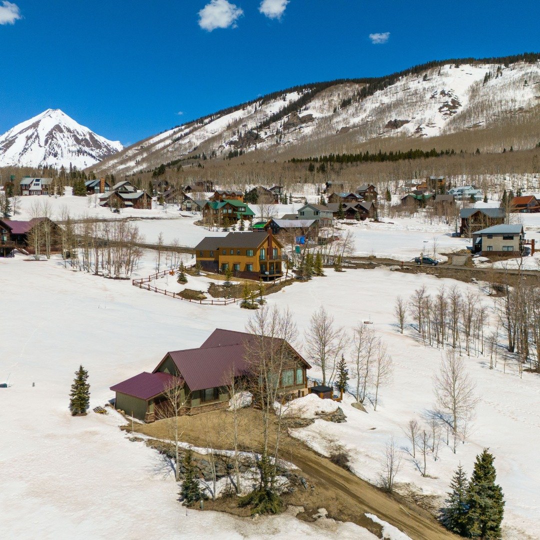 Welcome to your mountain home at 93 Meridian Lake Drive in the Meridian Lake Park subdivision. Step inside to discover a bright and inviting living space with a wall of windows taking in the beauty of Crested Butte Mountain and the expansive down val