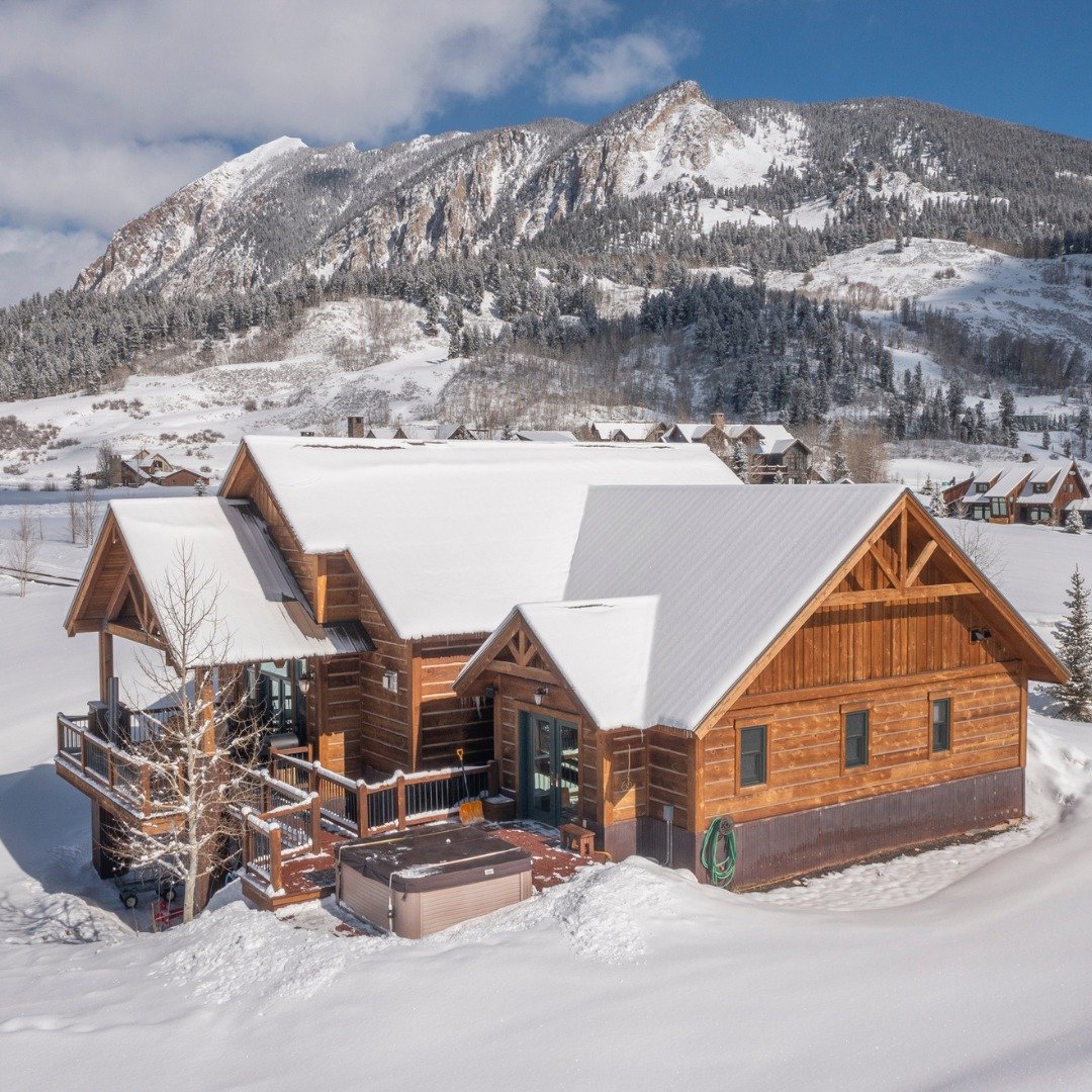 Introducing 324 N. Avion Drive, located within the Buckhorn Subdivision on the private runway at the Crested Butte Airpark. Custom-crafted by well-renowned local builder, Cedar Ridge Construction, this expansive home boasts 4 bedrooms, dual living ar