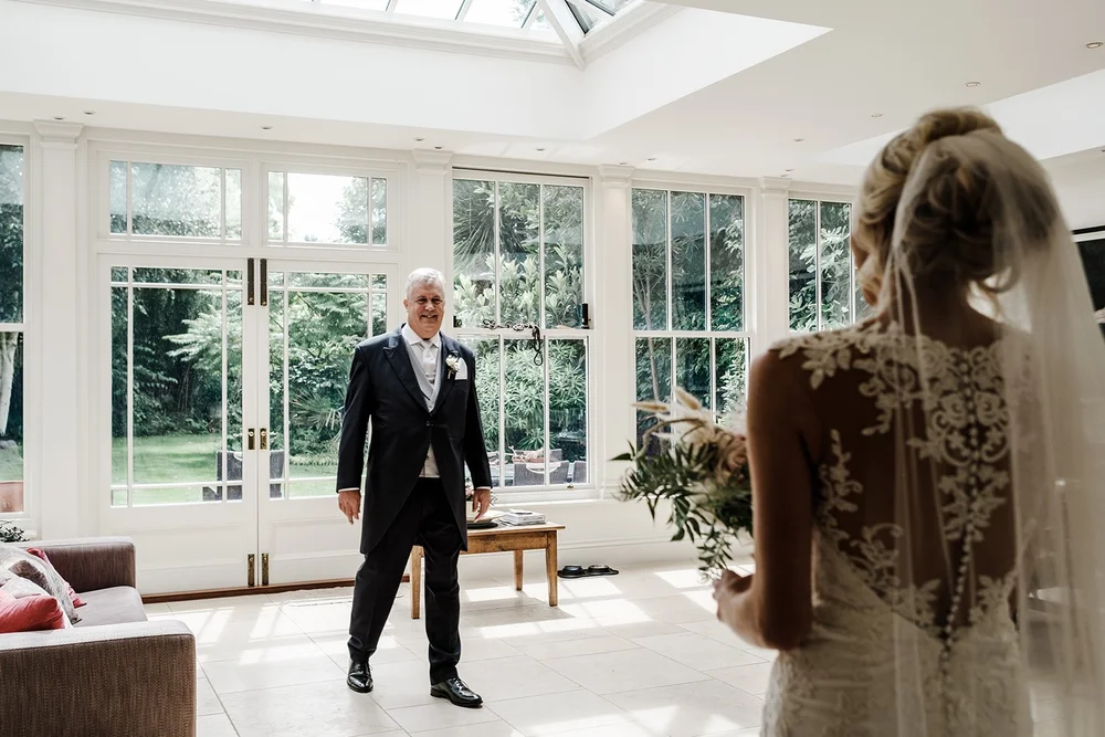 Katie&rsquo;s father seeing her in her wedding dress for the first time
