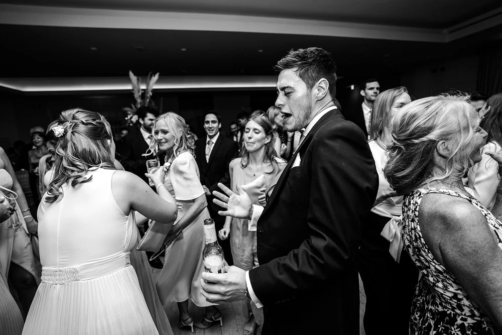 Katie dancing with her guests in the evening at The Hurlingham Club