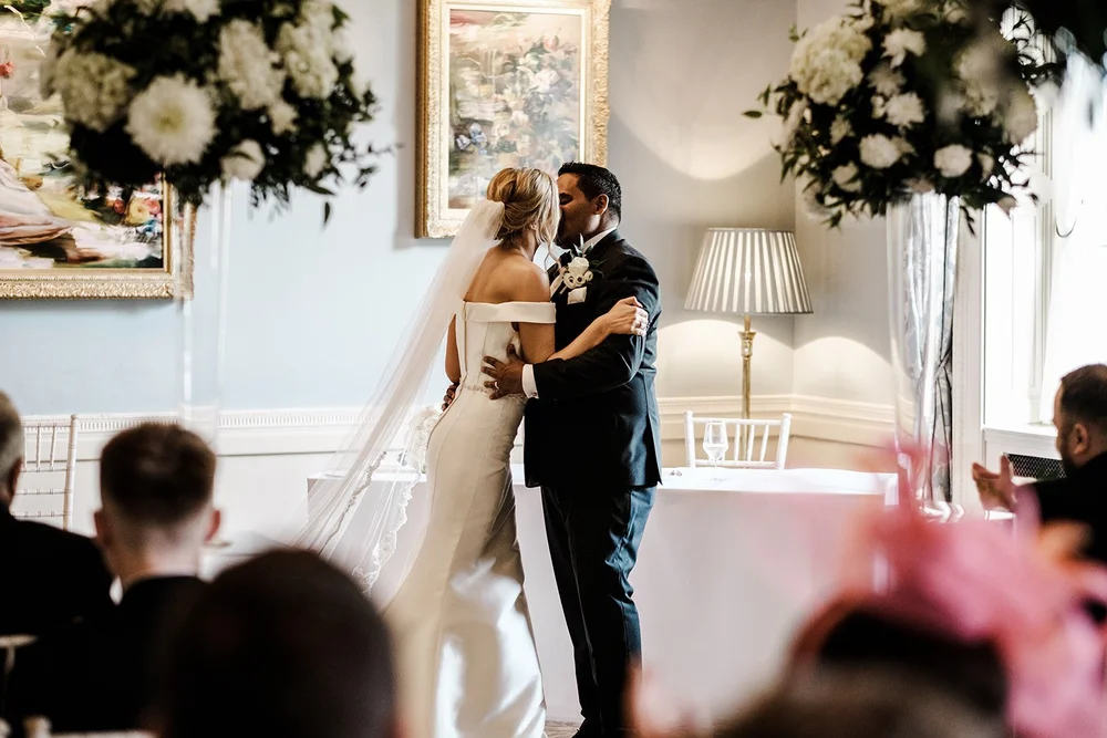 Bernie and Naesan dancing closely during the reception at Grantley Hall