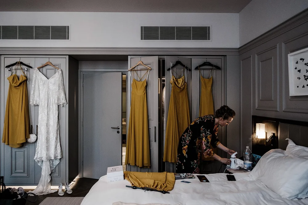 Anna&rsquo;s wedding dress hanging in the room before the ceremony