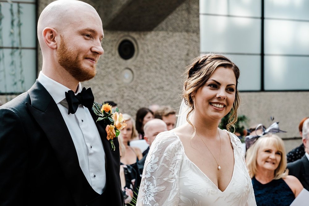 Guests watching the ceremony in the Barbican Conservatory