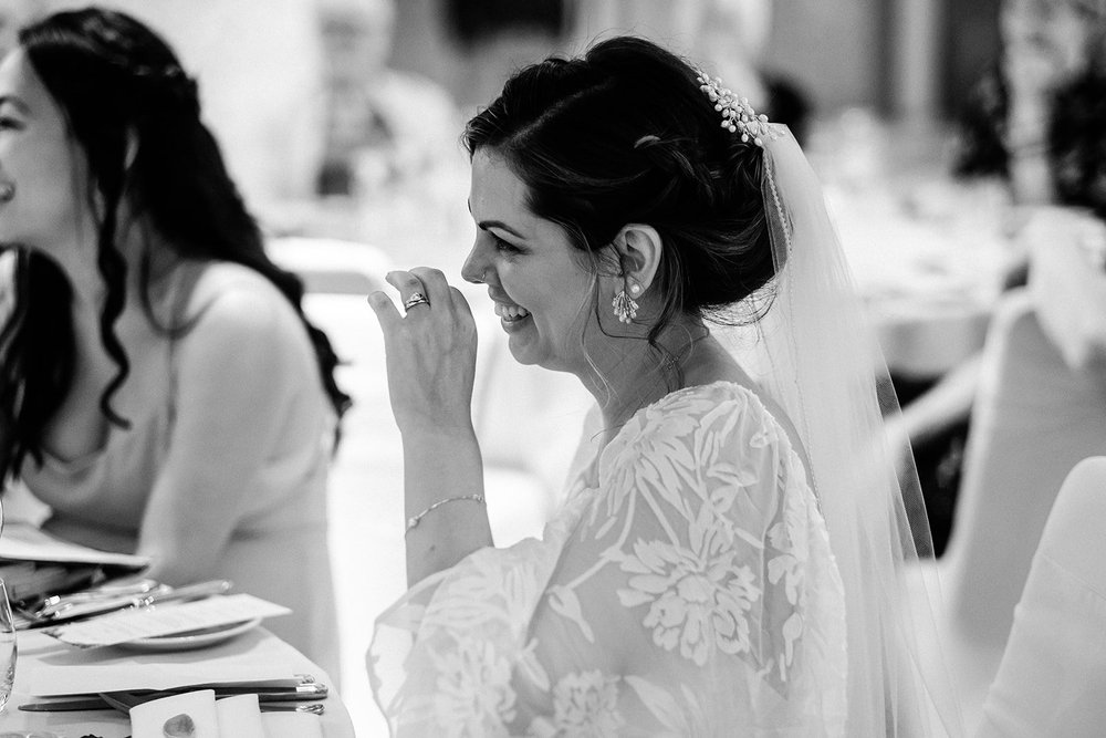 Black and white photograph of a guest during the speeches