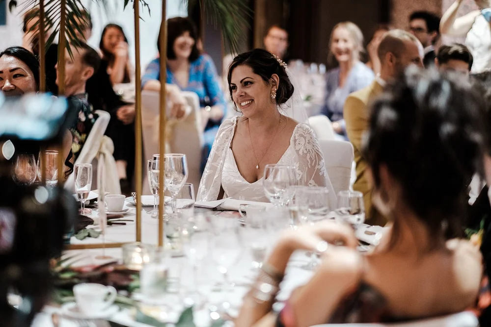 Anna listening to the speeches at the wedding breakfast
